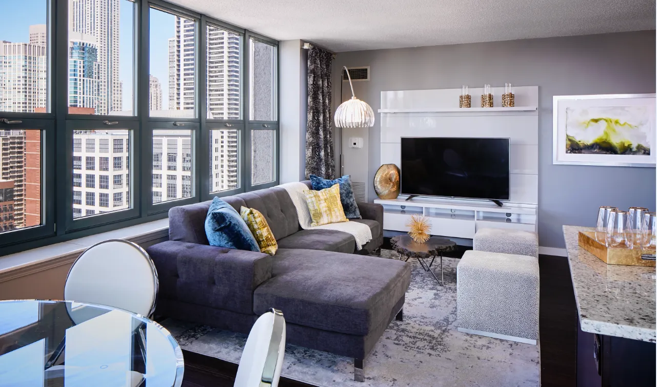 model living room with furnishings at One Superior Place Apartments