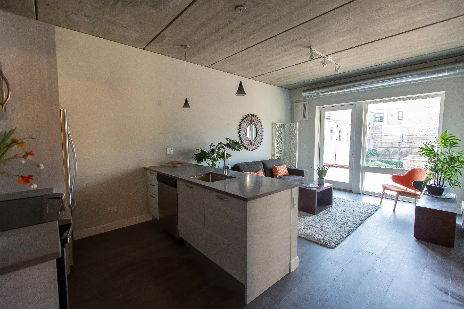 furnished luxury kitchen and living room at The Westerner Apartments