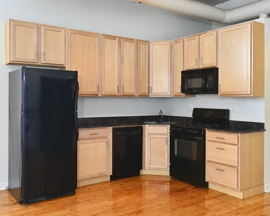 kitchen and living area at 1471 North Milwaukee Apartments  in Wicker Park