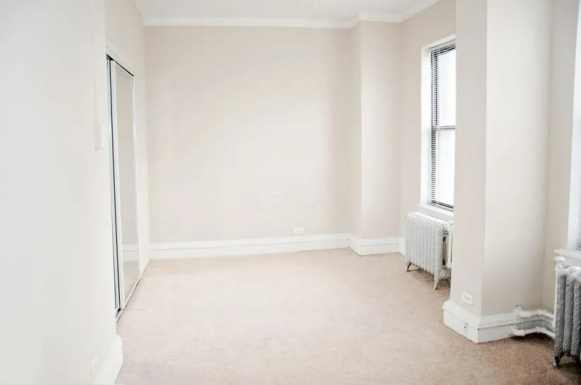 facade of the original historic The Mayfair Apartments in Hyde Park Chicago