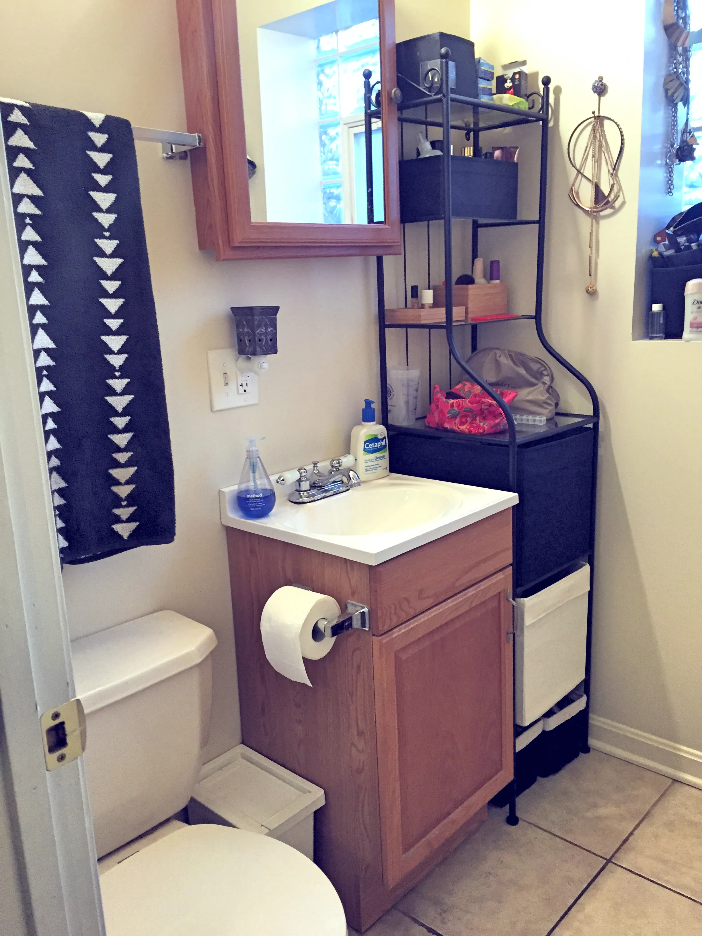 Newly Tiled Bathroom w/ sink storage and mirror storage
