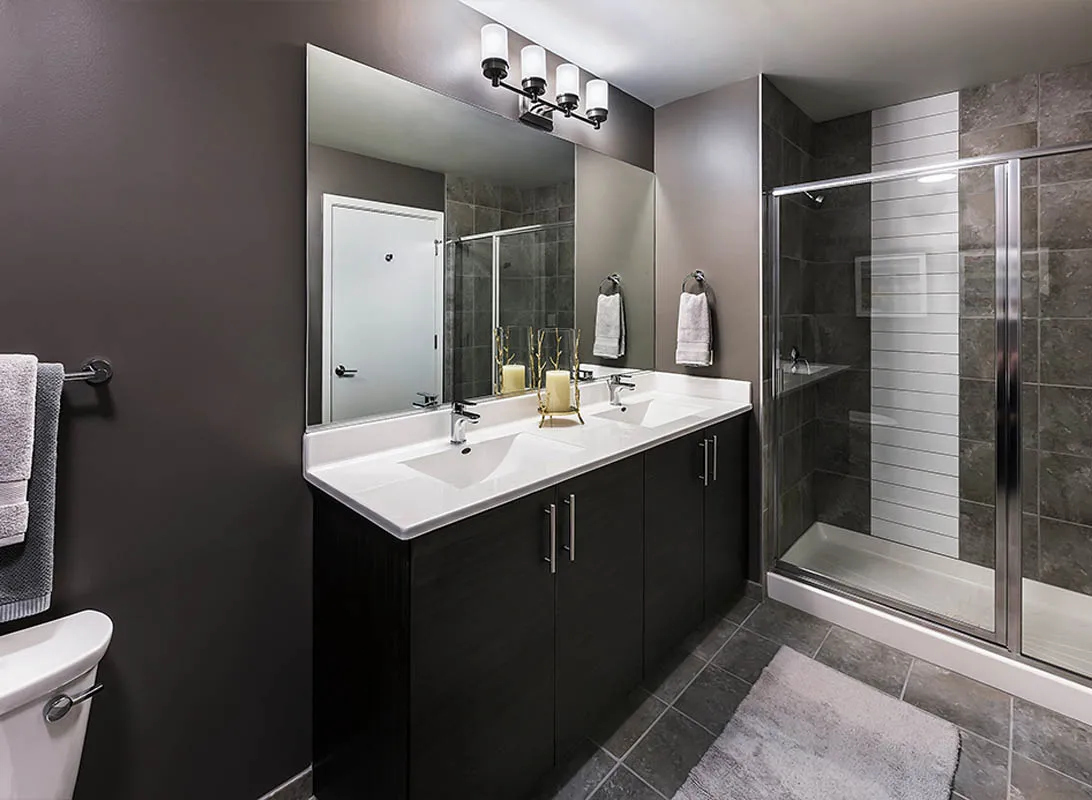 kitchen with view of living room at The Madison at Racine Apartments
