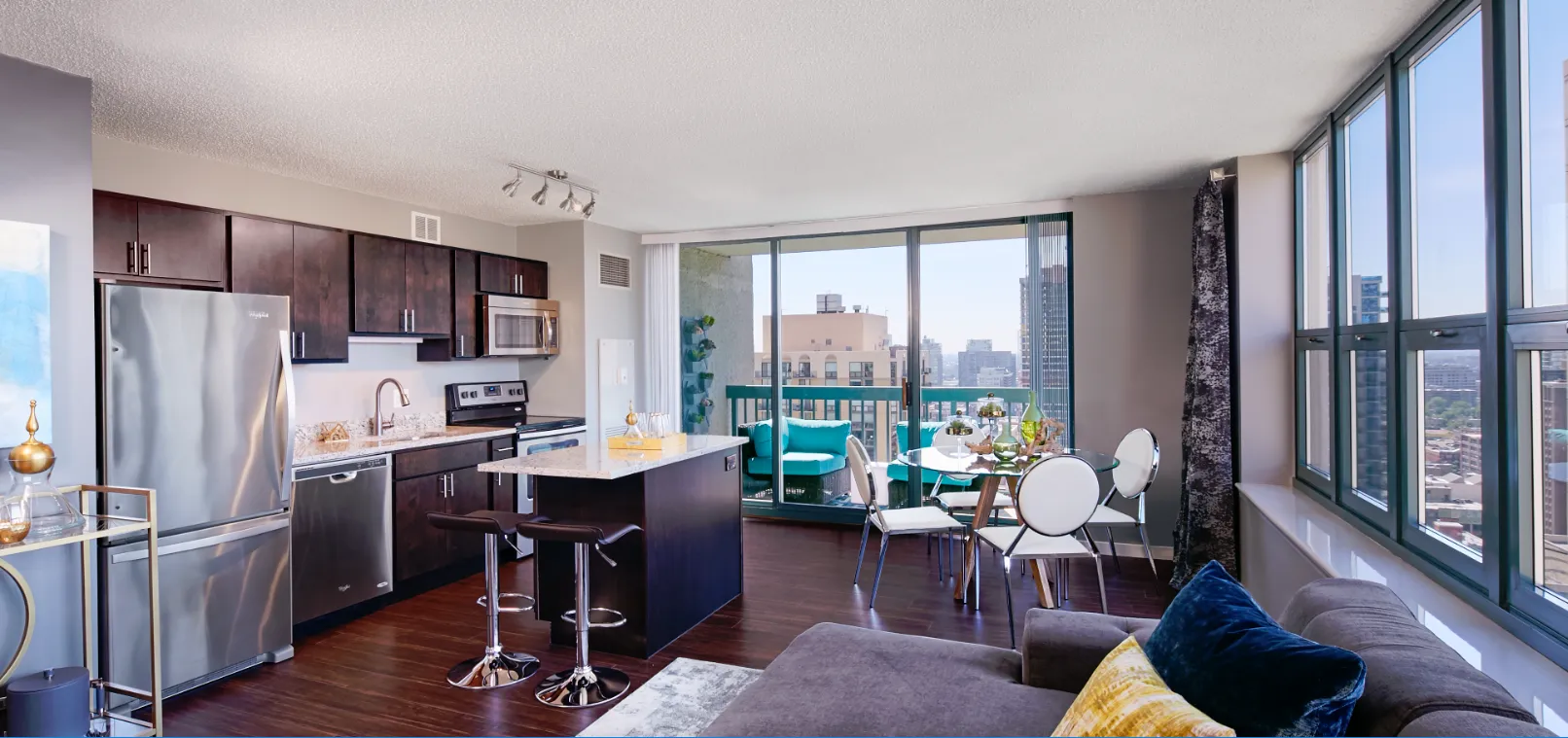 model living room with furnishings at One Superior Place Apartments