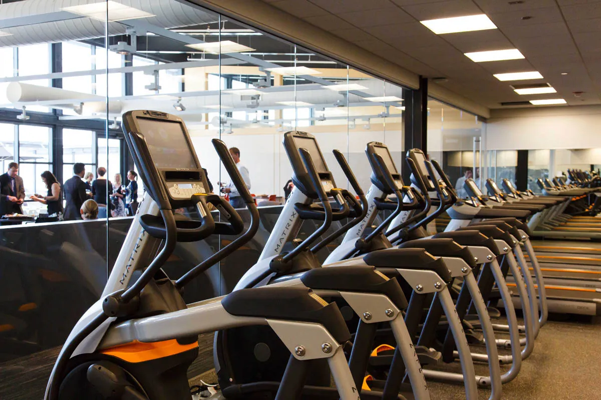 furnished living room with glass window at SoNo East Apartments
