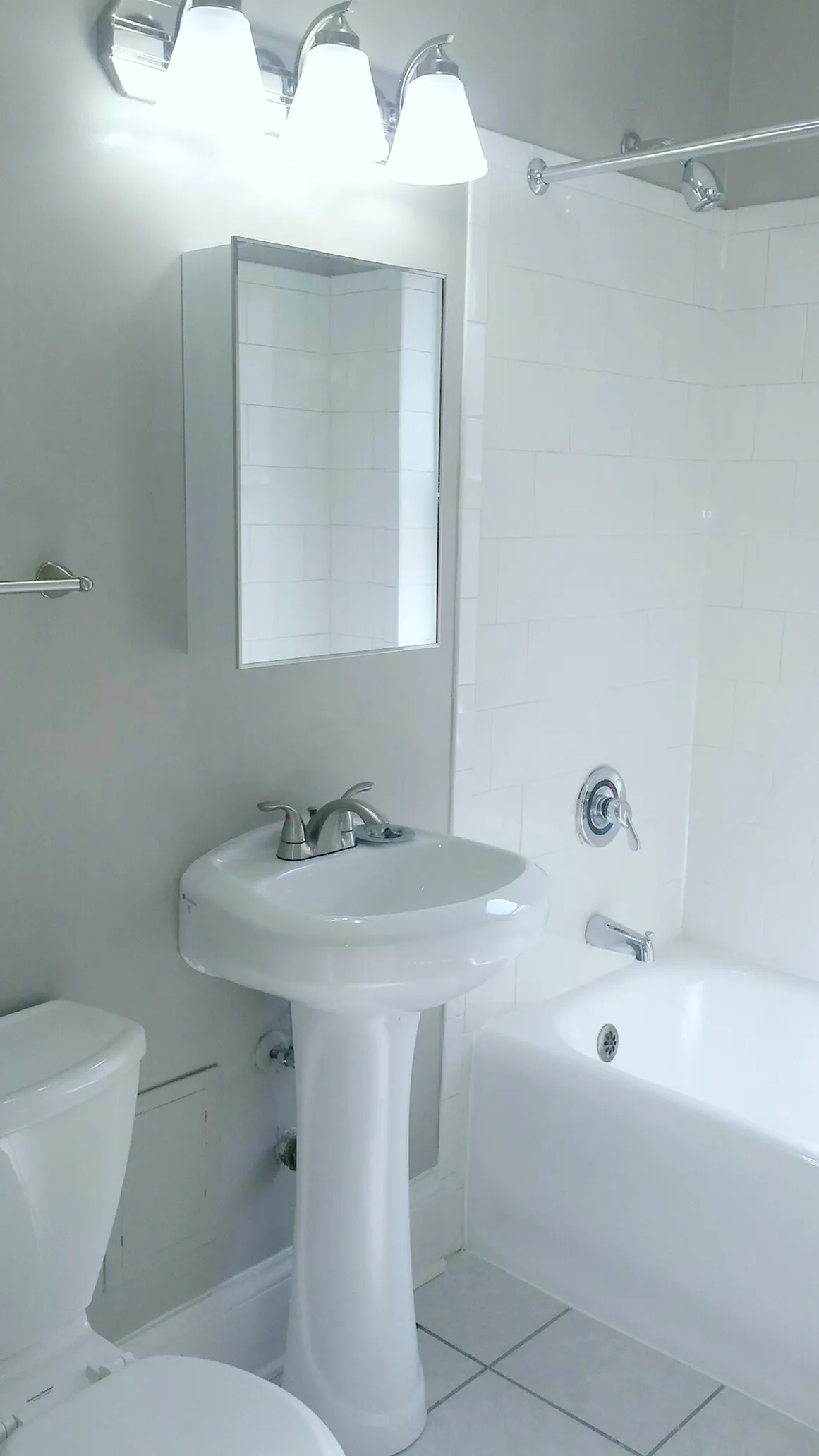 exterior courtyard with brick wall at 1261 West Argyle apartments