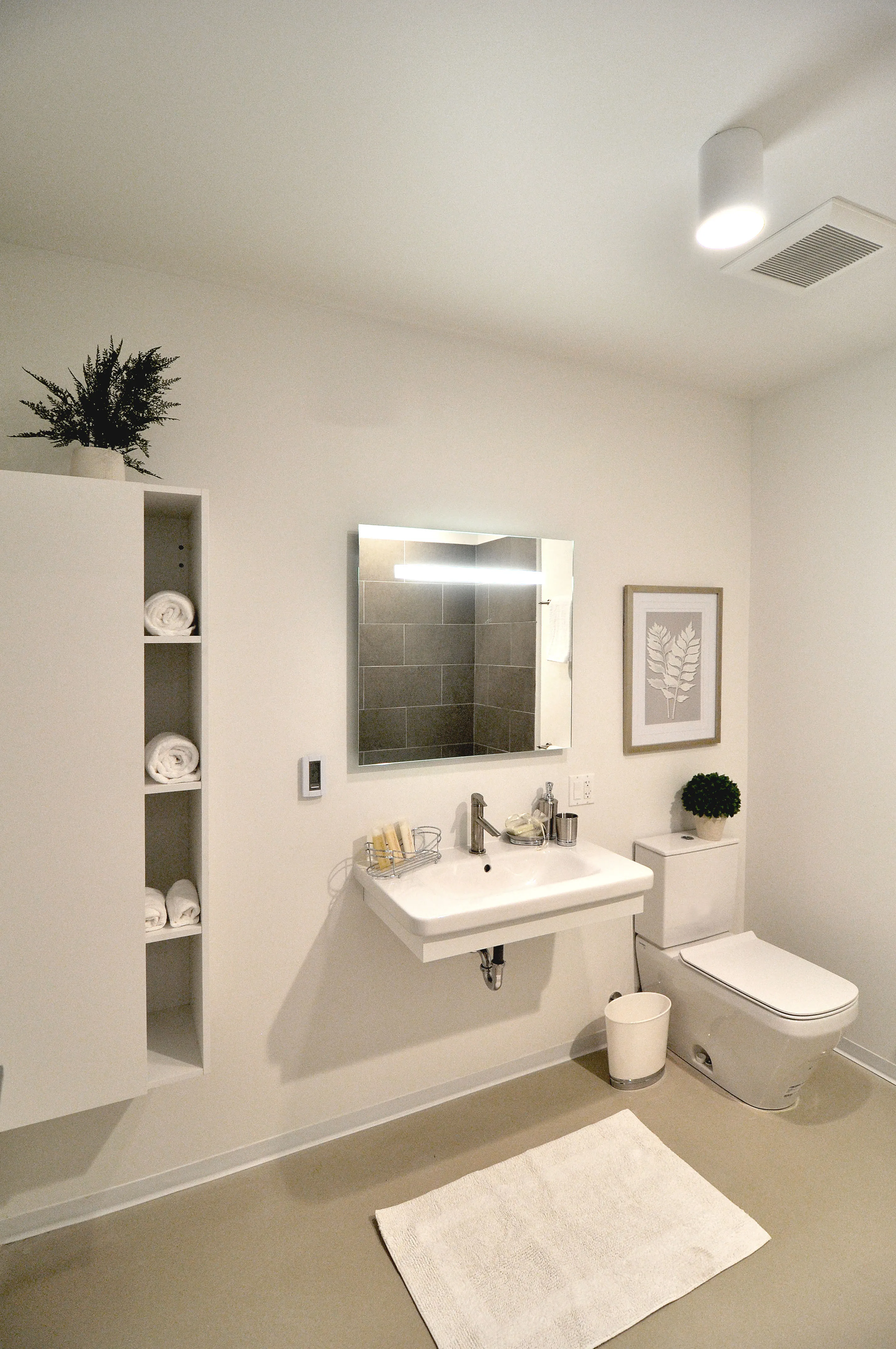 model living room and kitchen at Wicker Park Lofts