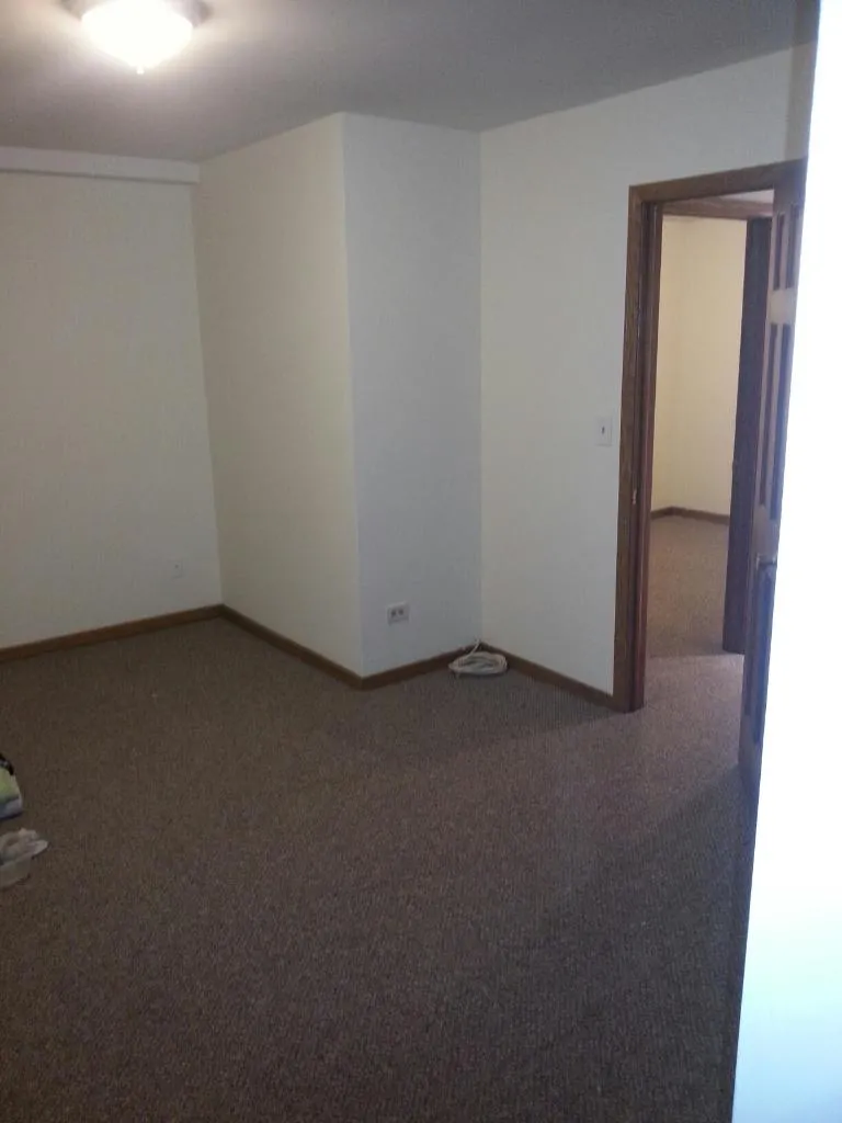 outside front of 3733 North Janssen Apartments in Lakeview Chicago