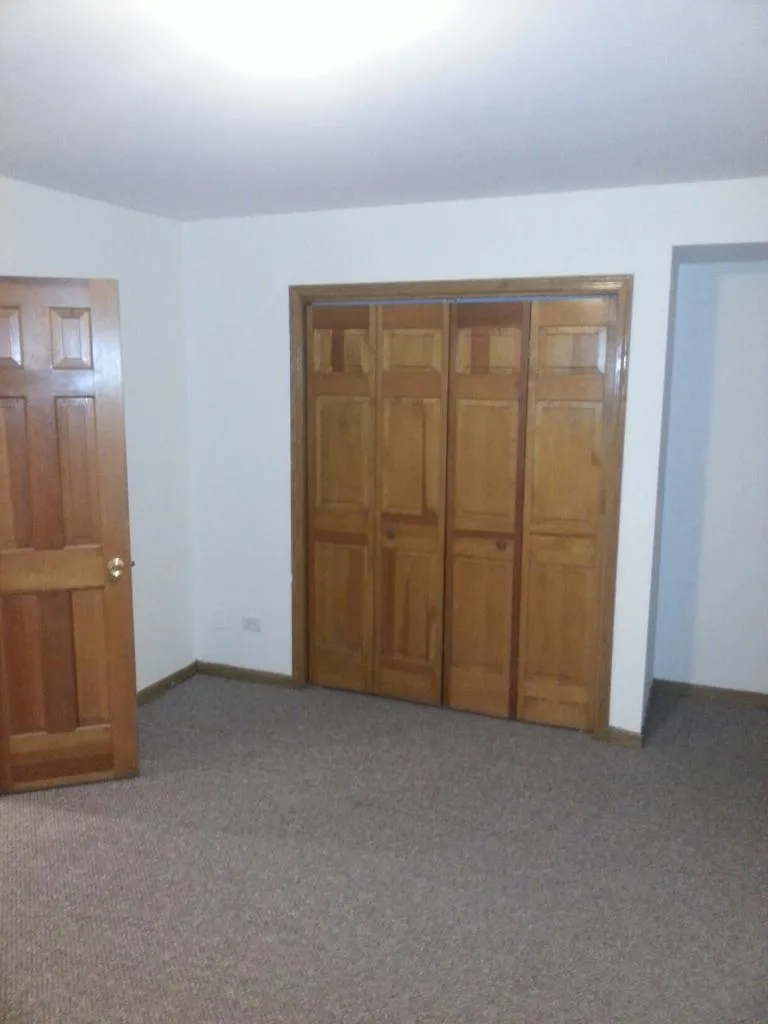 outside front of 3733 North Janssen Apartments in Lakeview Chicago