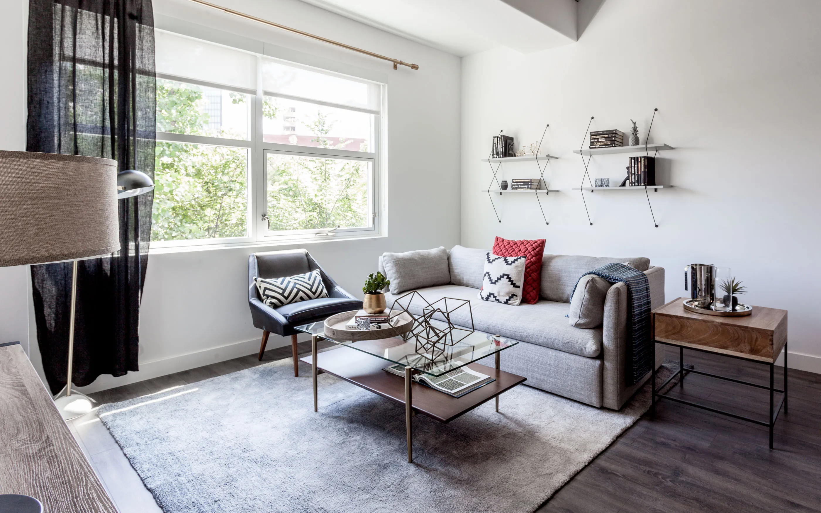 kitchen and living area in one bedroom model at Centrum Evanston Apartments