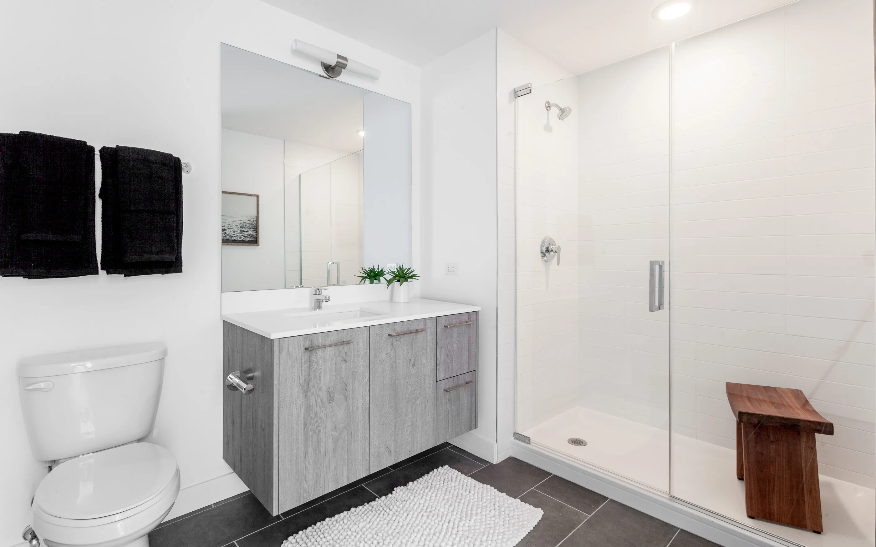 kitchen and living area in one bedroom model at Centrum Evanston Apartments