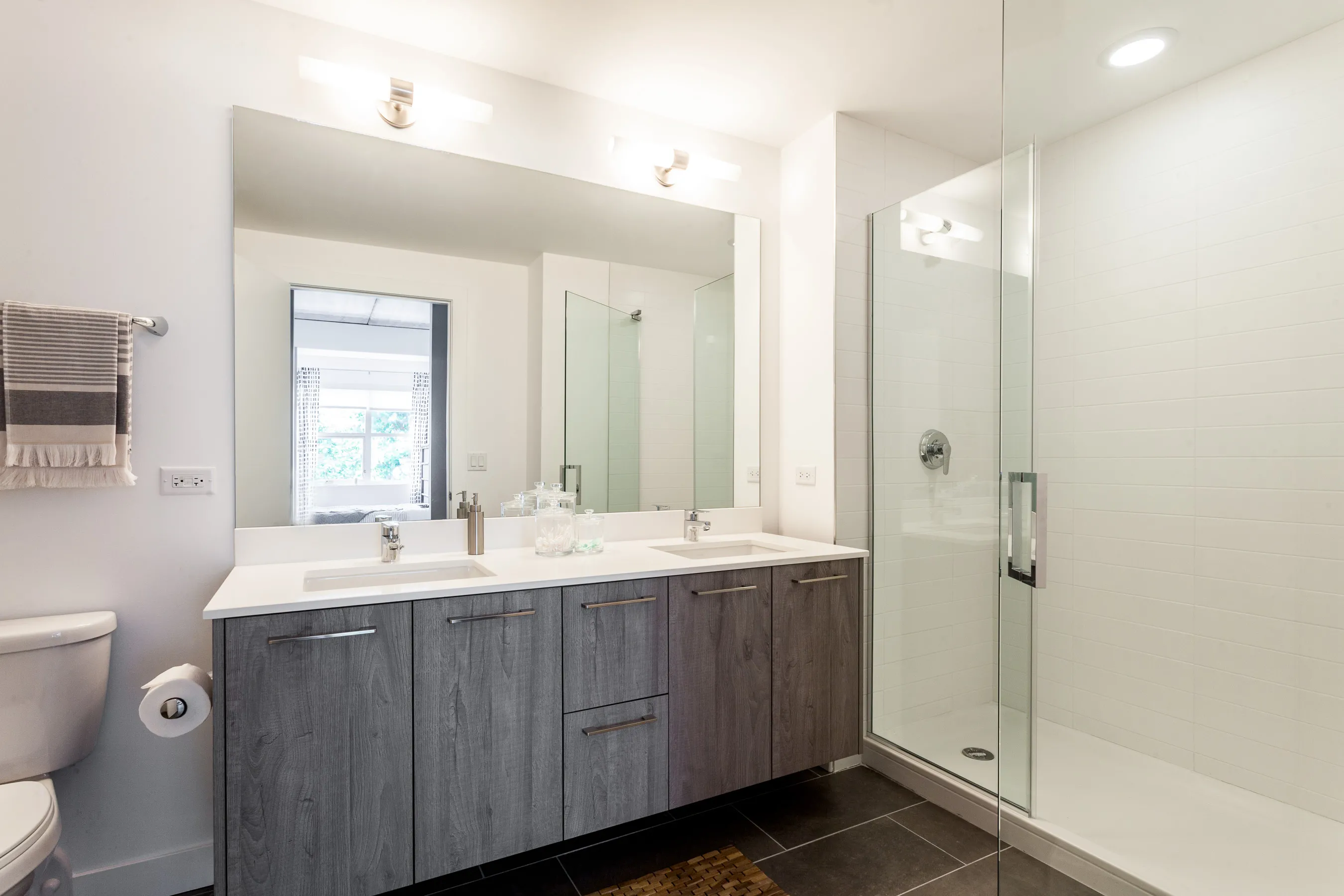 kitchen and living area in one bedroom model at Centrum Evanston Apartments