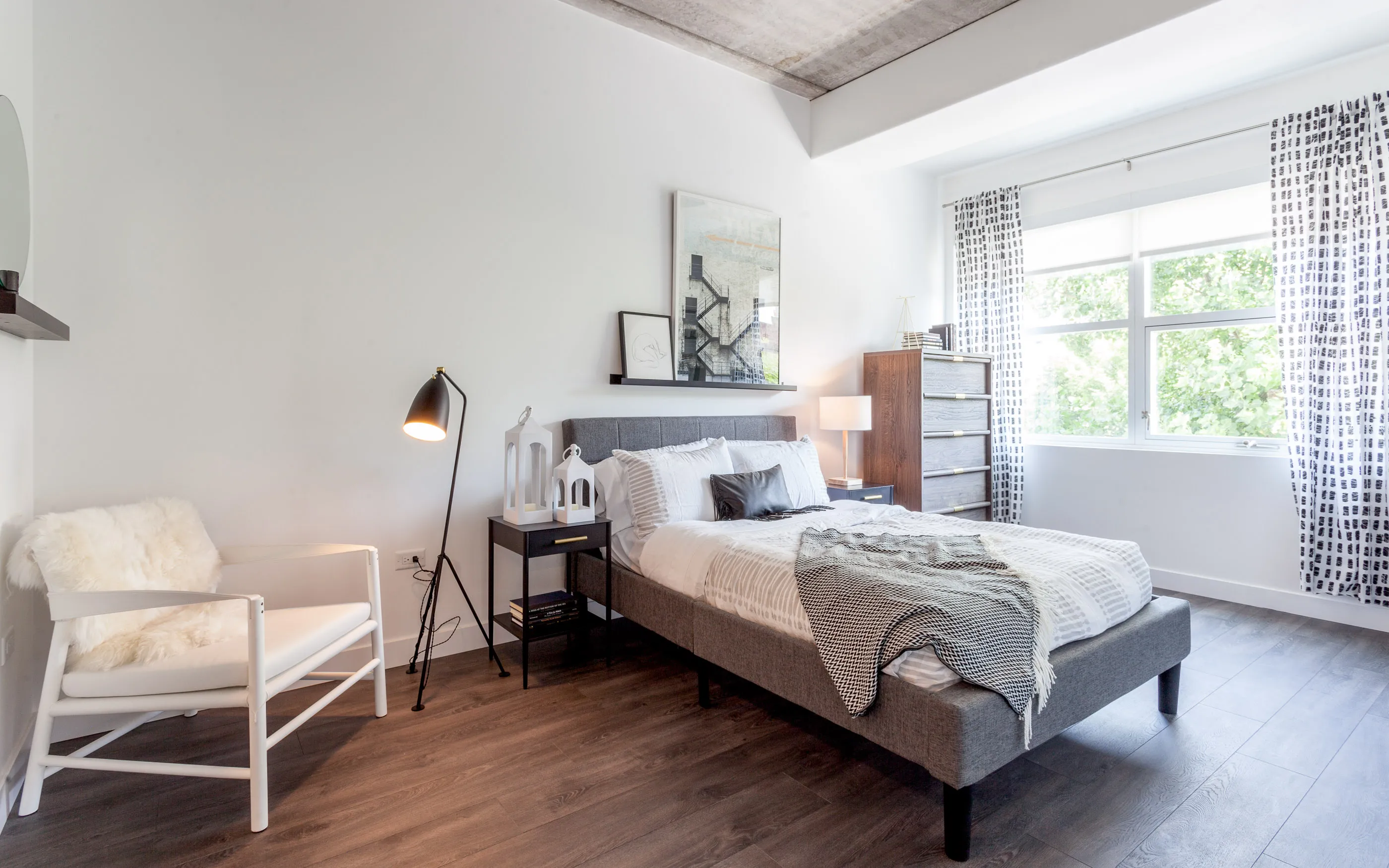 kitchen and living area in one bedroom model at Centrum Evanston Apartments