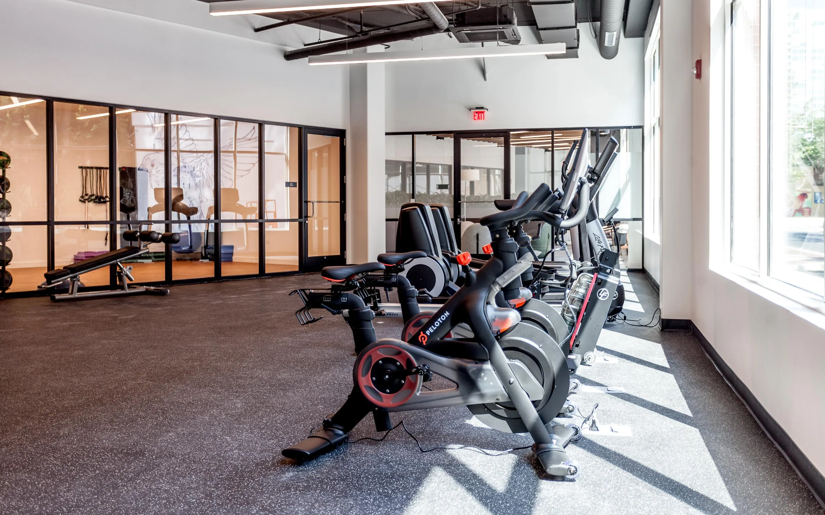 kitchen and living area in one bedroom model at Centrum Evanston Apartments