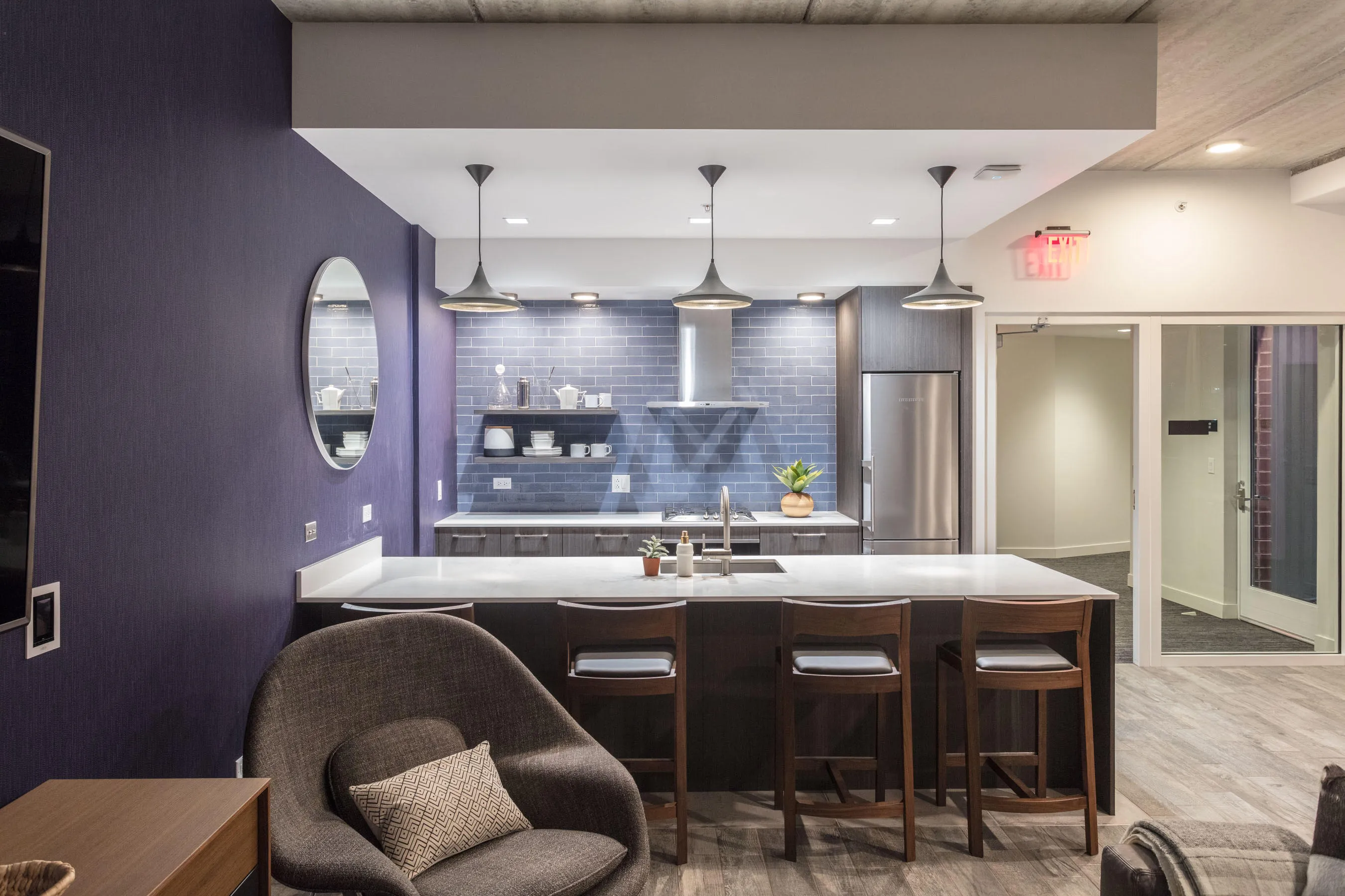 kitchen and living area in one bedroom model at Centrum Evanston Apartments