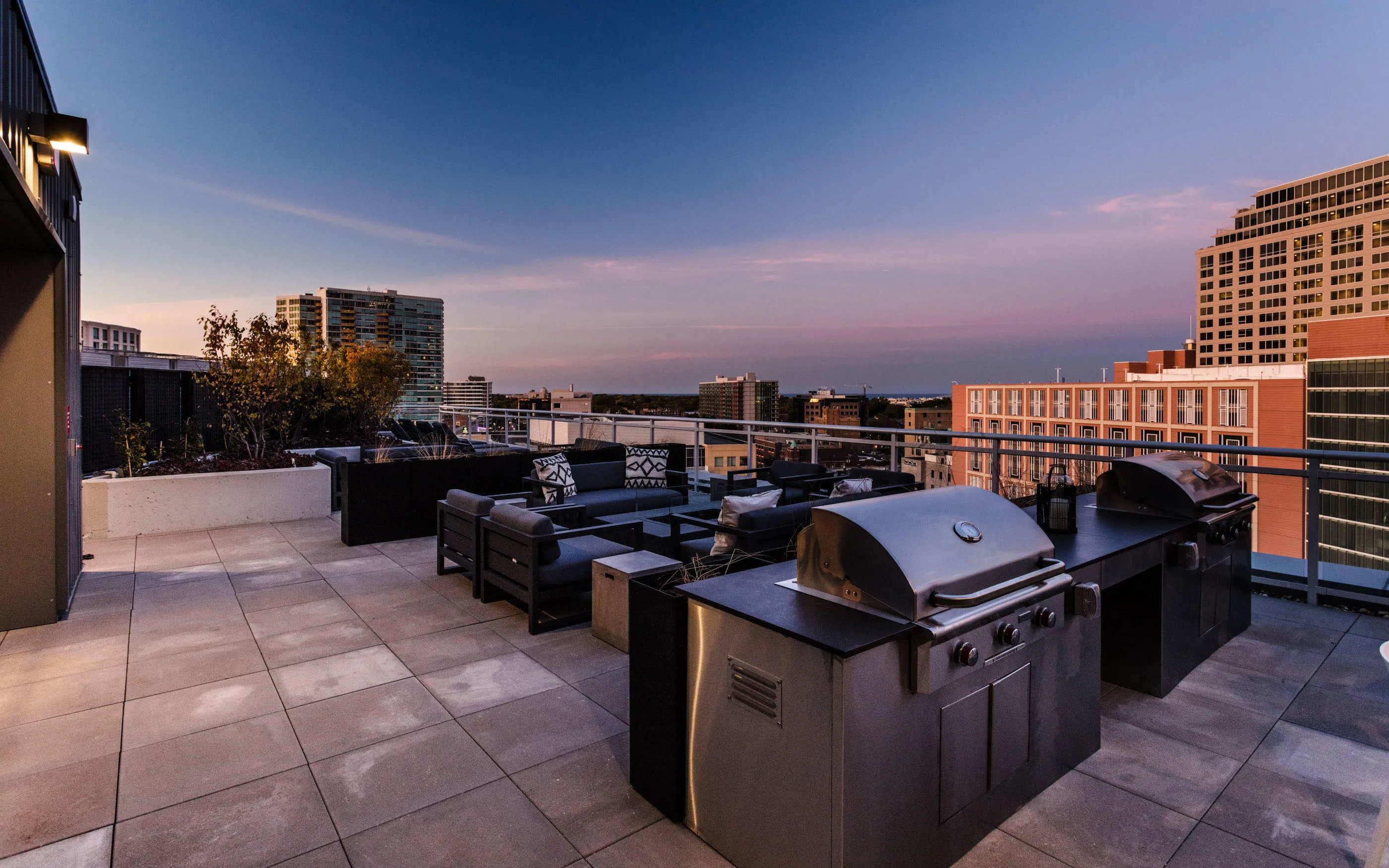 kitchen and living area in one bedroom model at Centrum Evanston Apartments