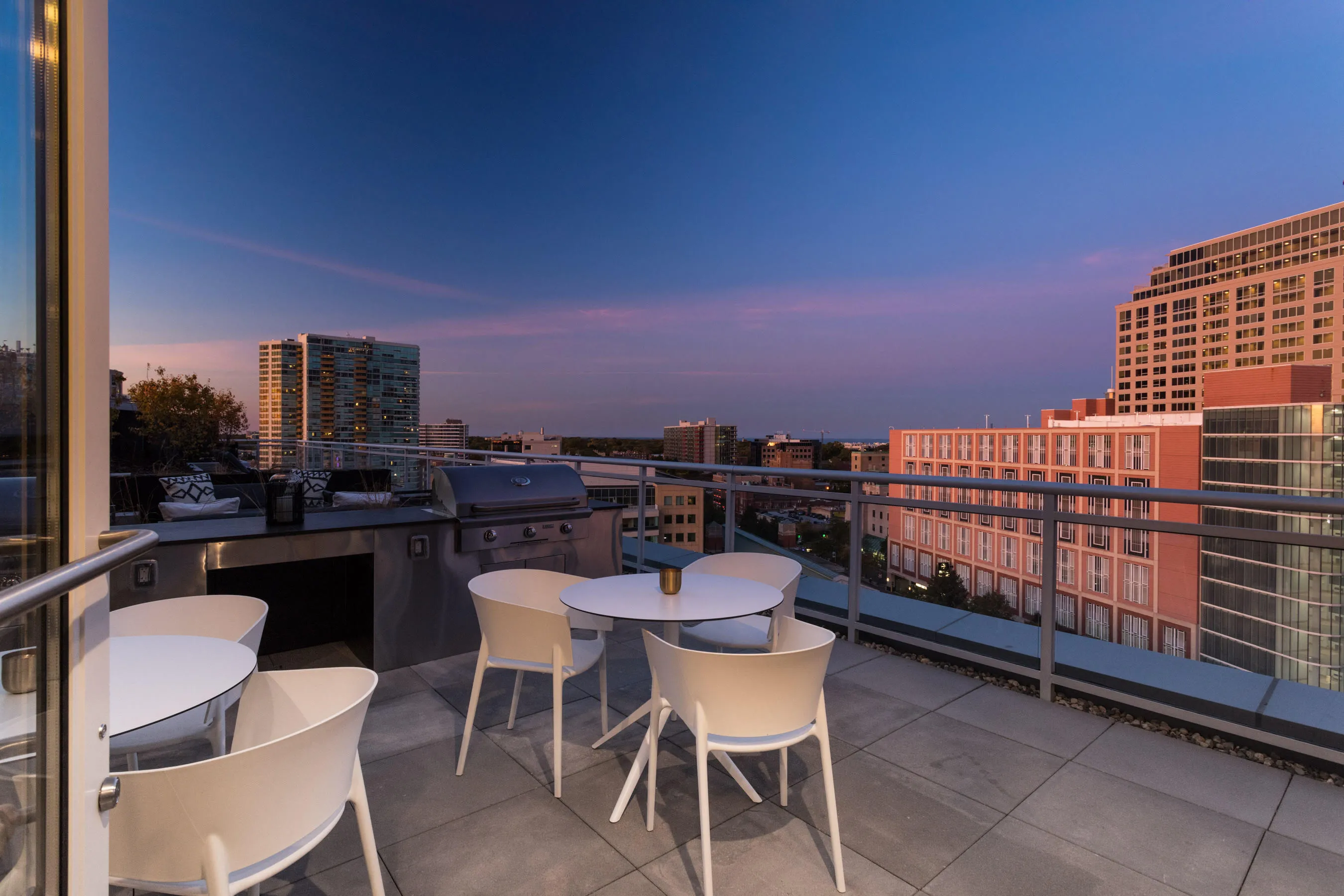 kitchen and living area in one bedroom model at Centrum Evanston Apartments