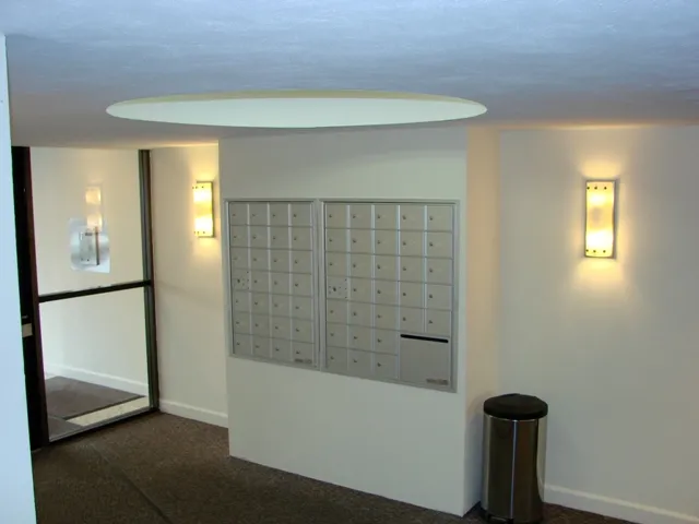 sidewalk view of the front of 421-431 West Barry Apartments in Lakeview