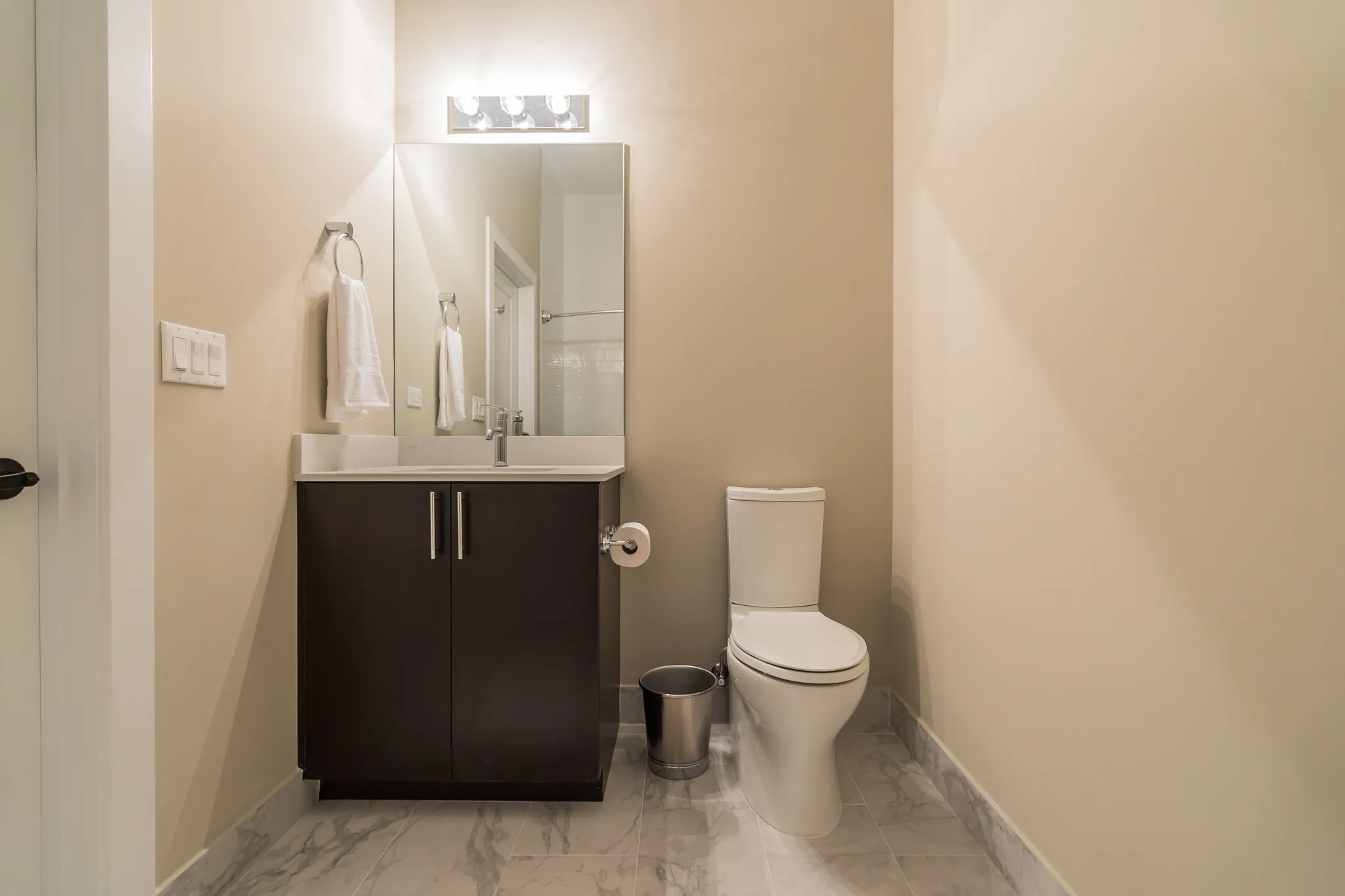 model living room at 933 West Belle Plaine in Uptown Chicago