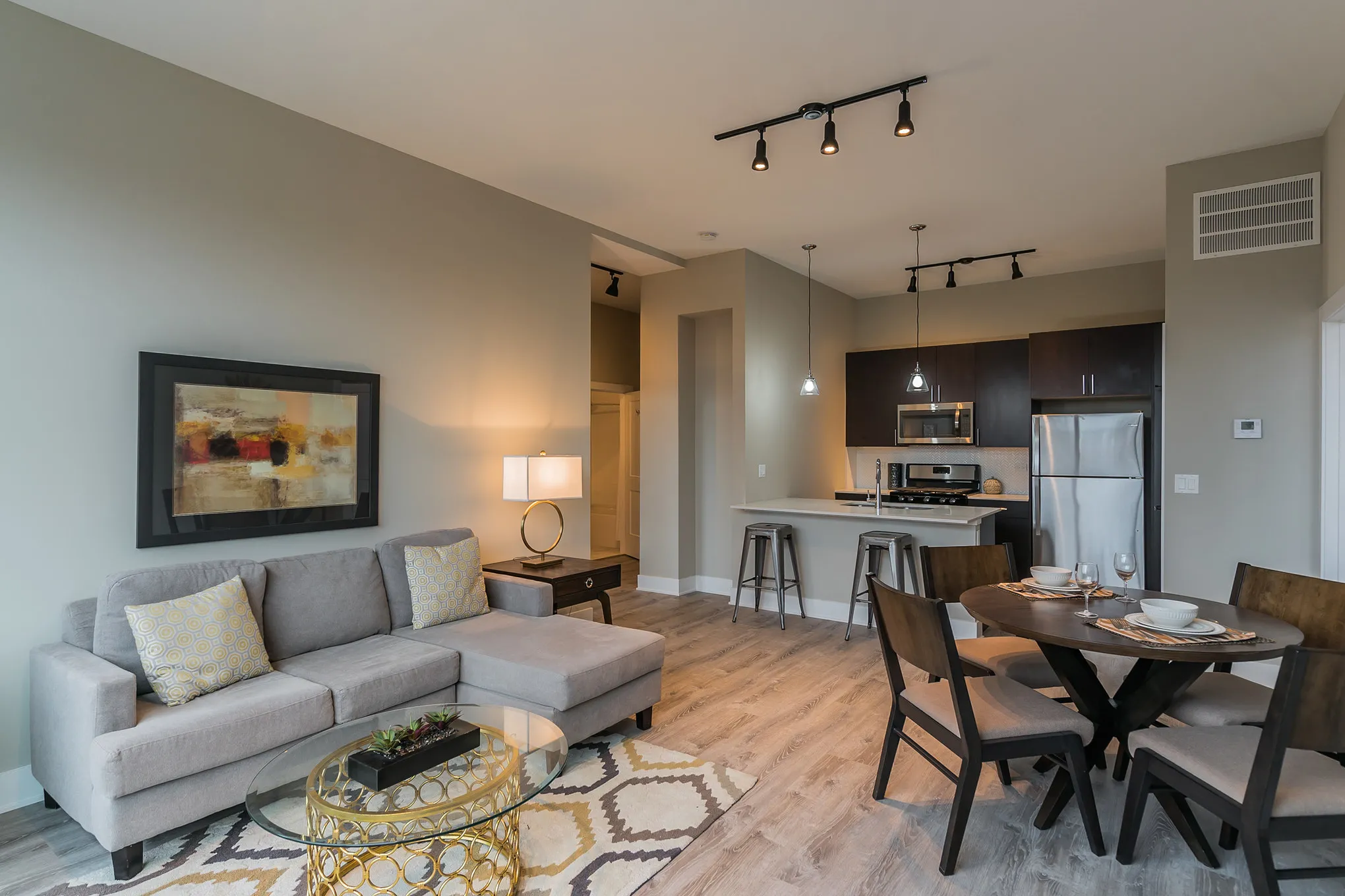 model living room at 933 West Belle Plaine in Uptown Chicago