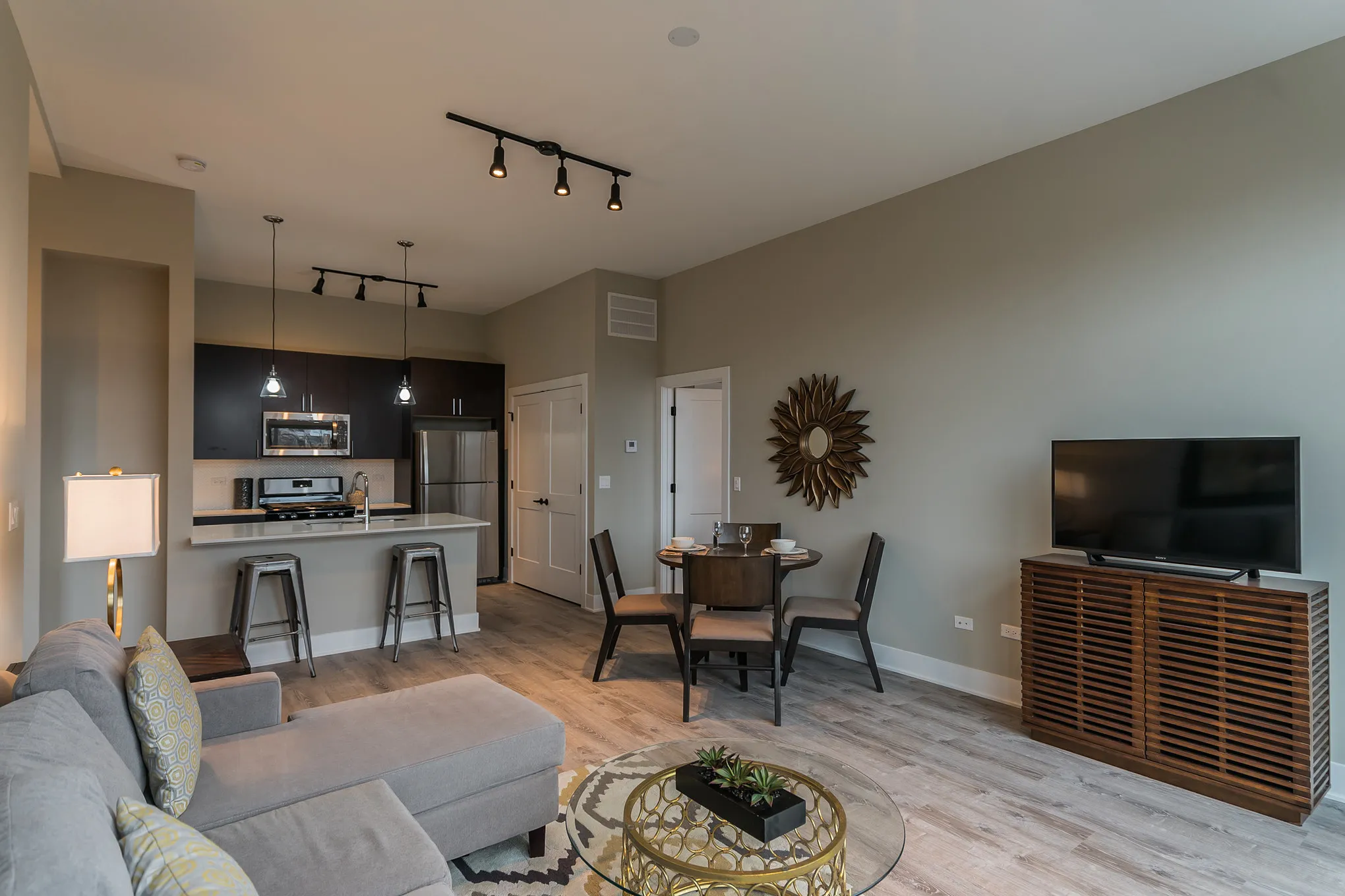 model living room at 933 West Belle Plaine in Uptown Chicago