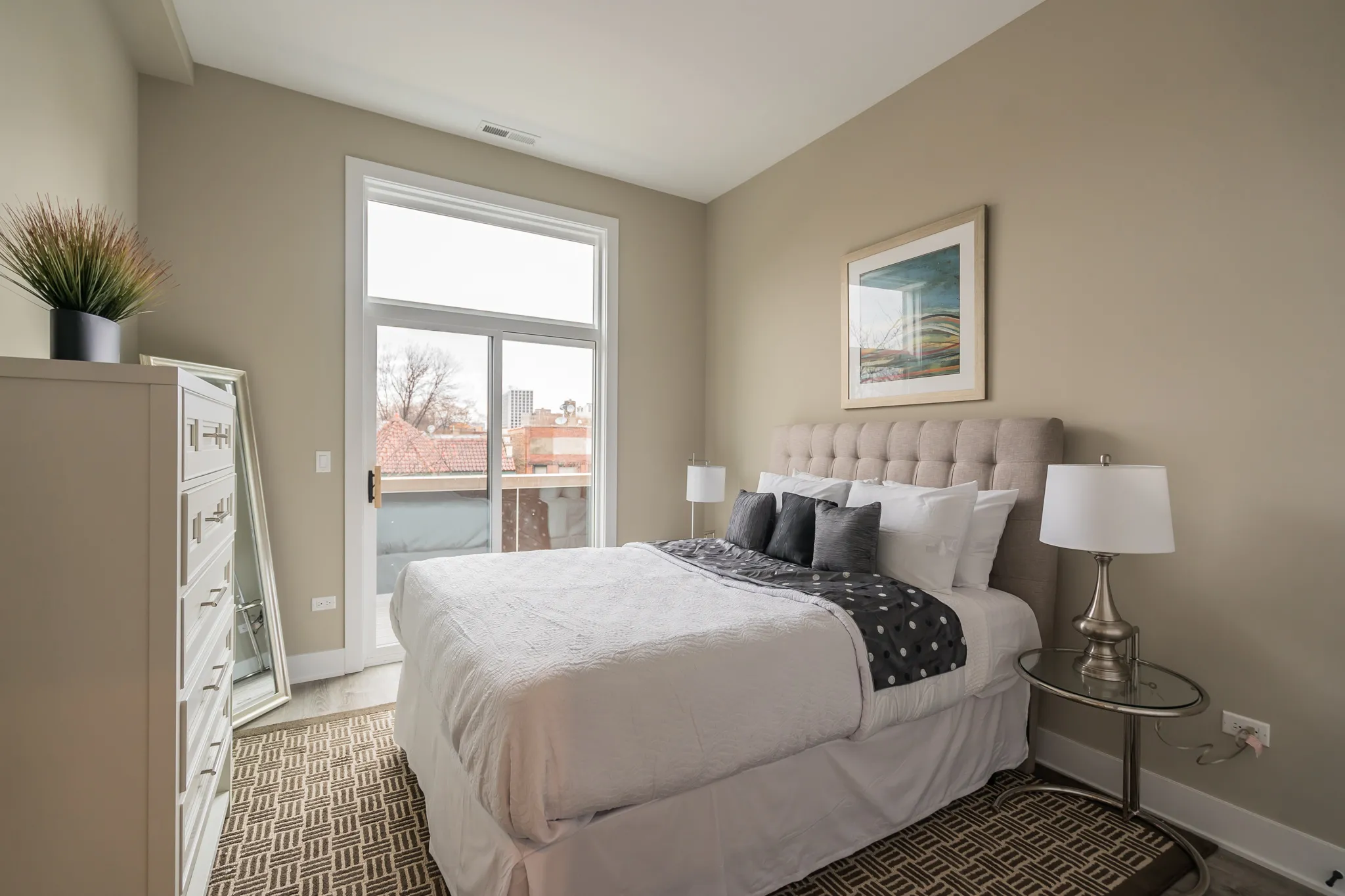 model living room at 933 West Belle Plaine in Uptown Chicago