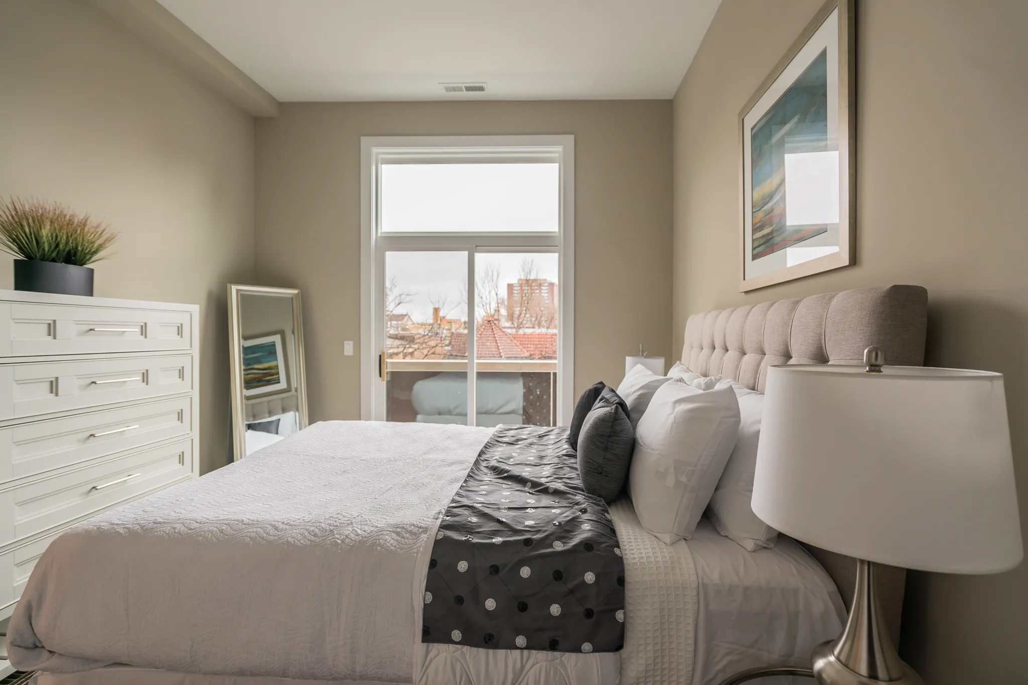 model living room at 933 West Belle Plaine in Uptown Chicago
