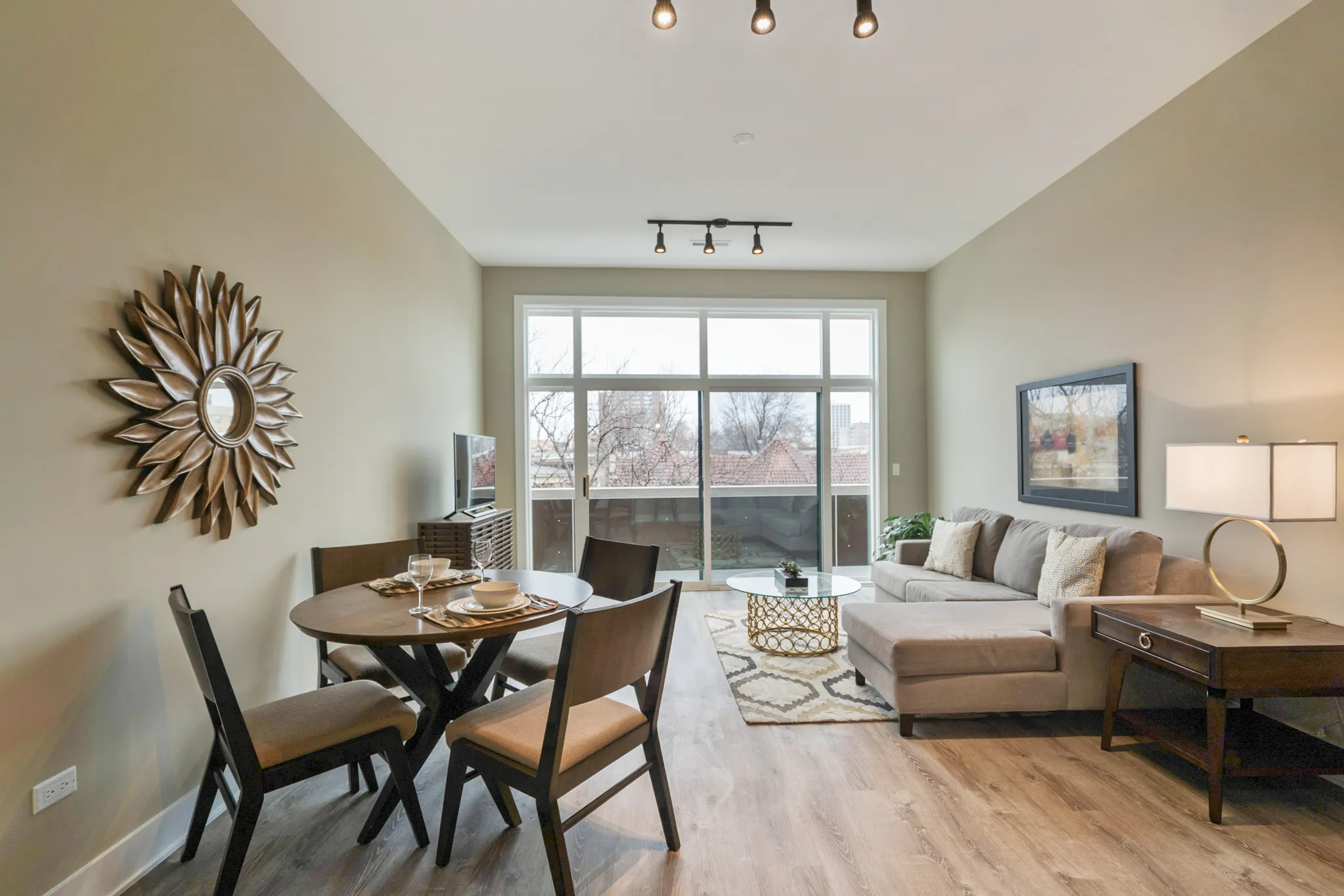 model living room at 933 West Belle Plaine in Uptown Chicago