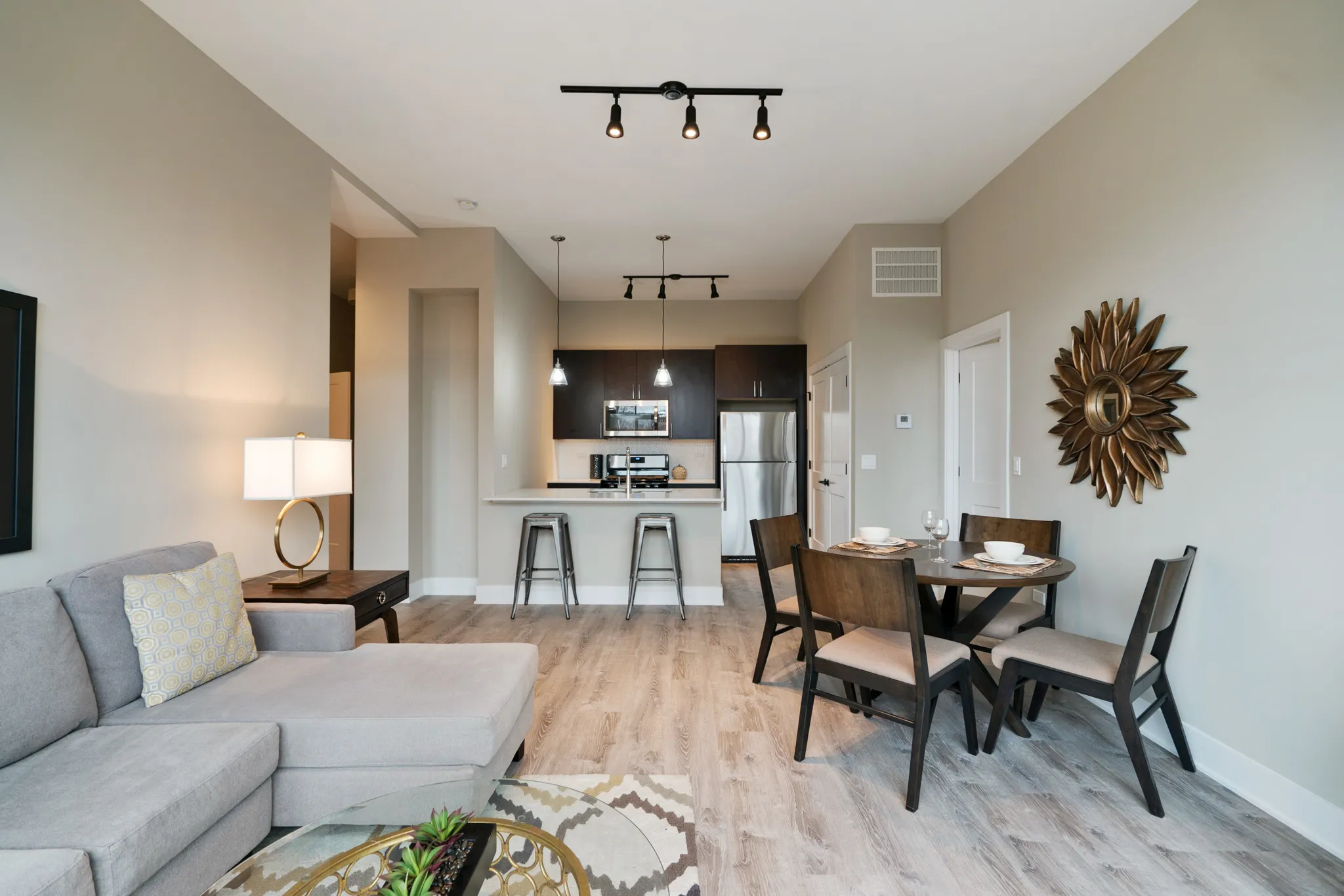 model living room at 933 West Belle Plaine in Uptown Chicago