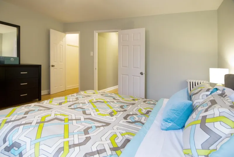 model living room at Elmhurst Terrace Apartments at 100 Fellows Ct.