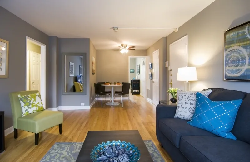 model living room at Elmhurst Terrace Apartments at 100 Fellows Ct.