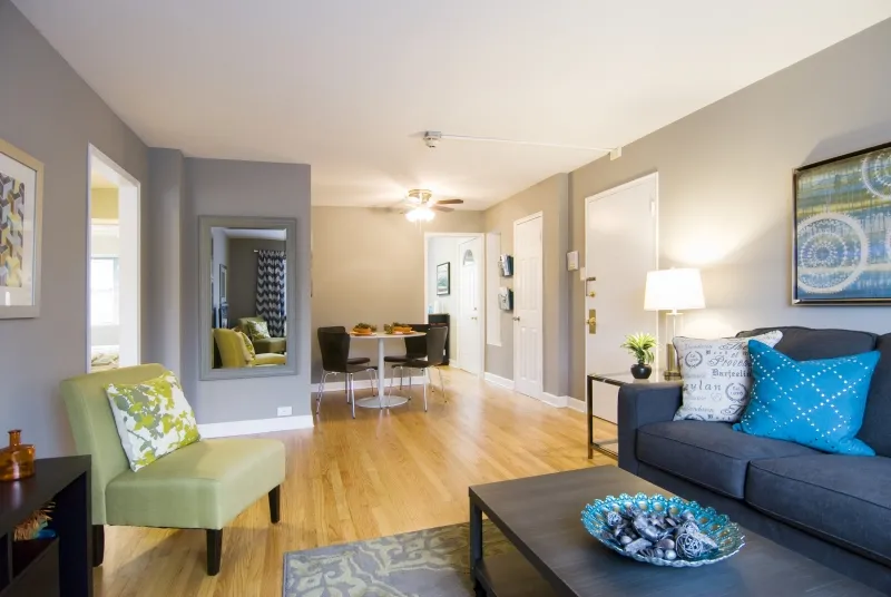 model living room at Elmhurst Terrace Apartments at 100 Fellows Ct.