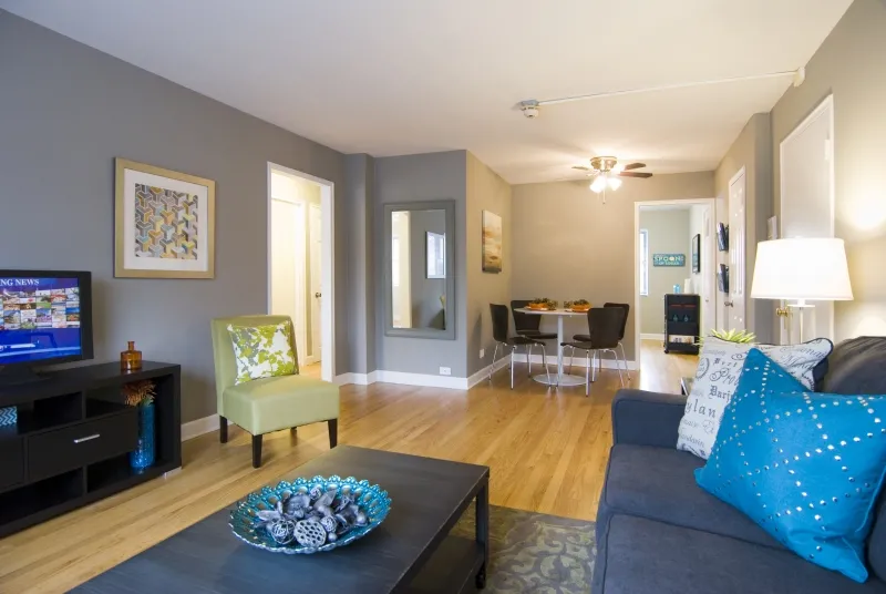 model living room at Elmhurst Terrace Apartments at 100 Fellows Ct.