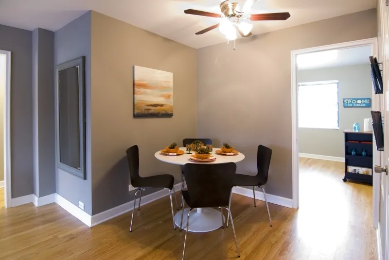 model living room at Elmhurst Terrace Apartments at 100 Fellows Ct.