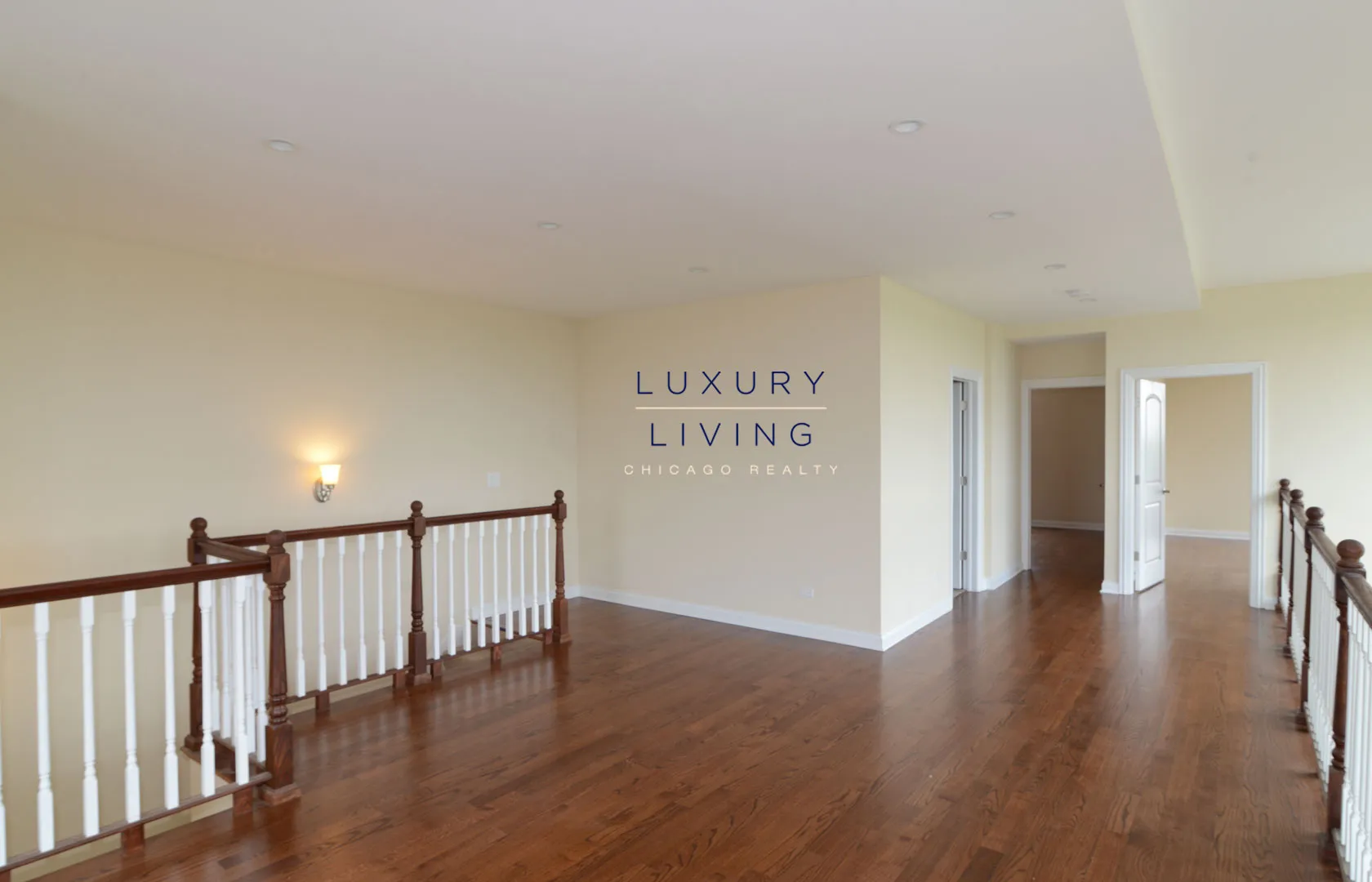 kitchen and island with wood floors at Riverview Terrace Apartments