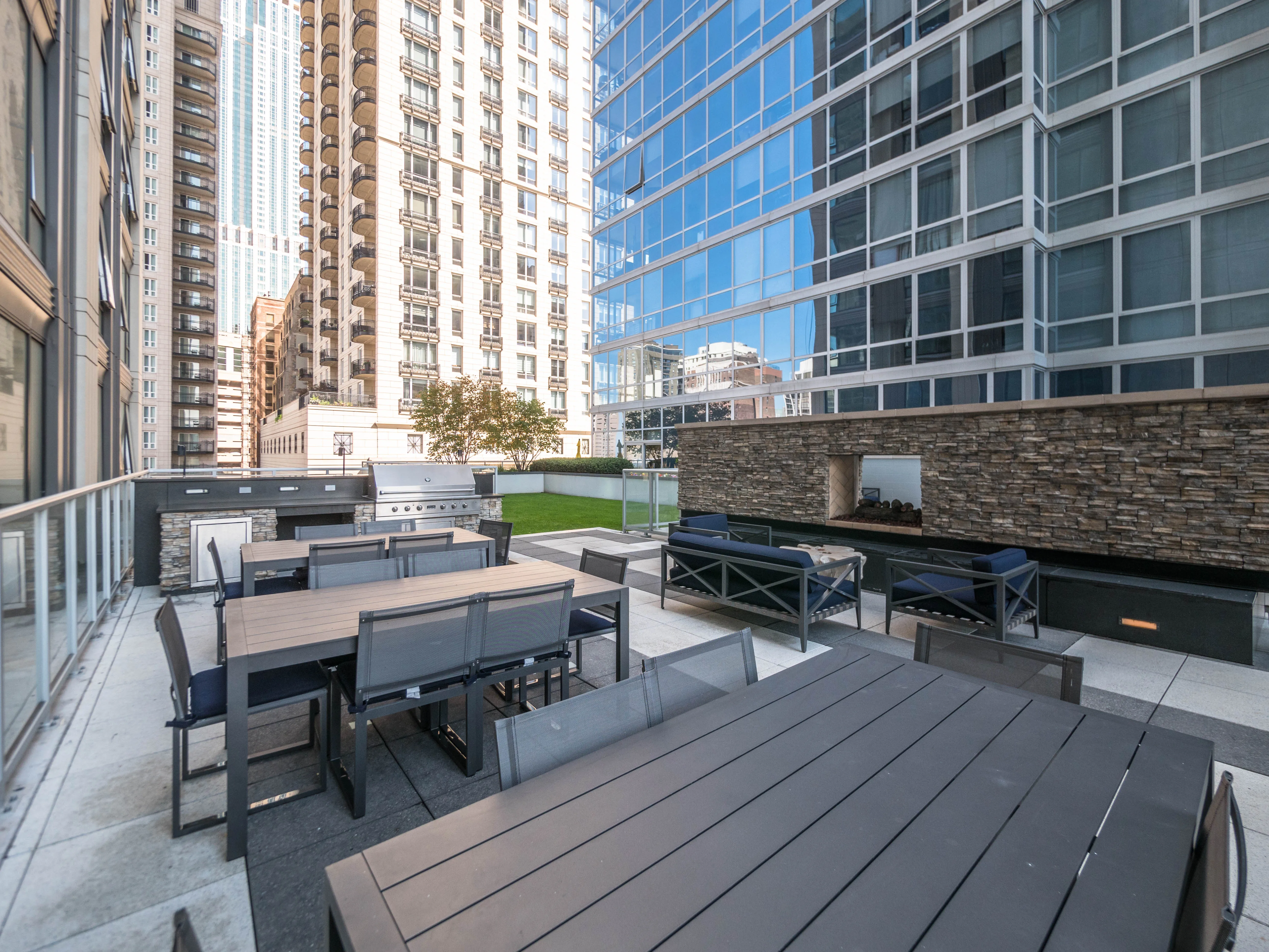 model corner furnished living room at Two West Delaware Apartments