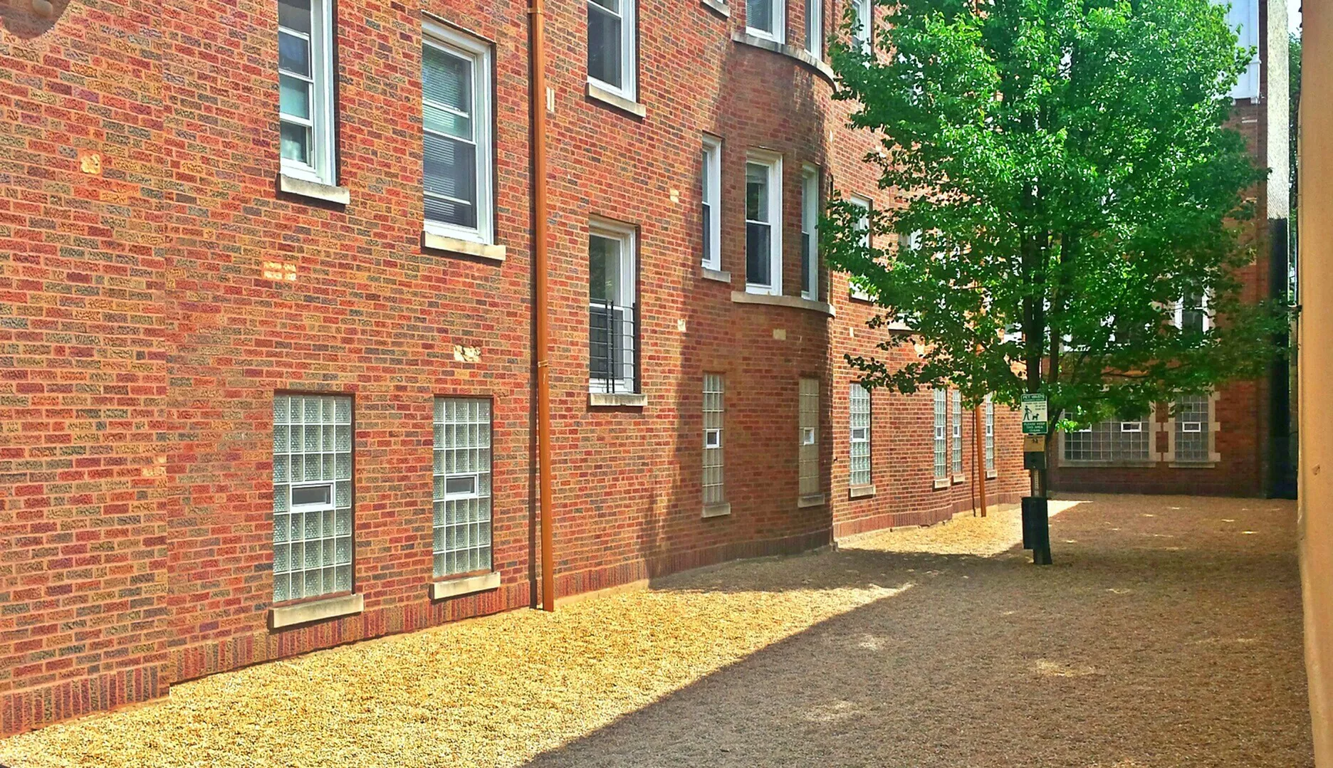exterior courtyard with brick wall at 1261 West Argyle apartments