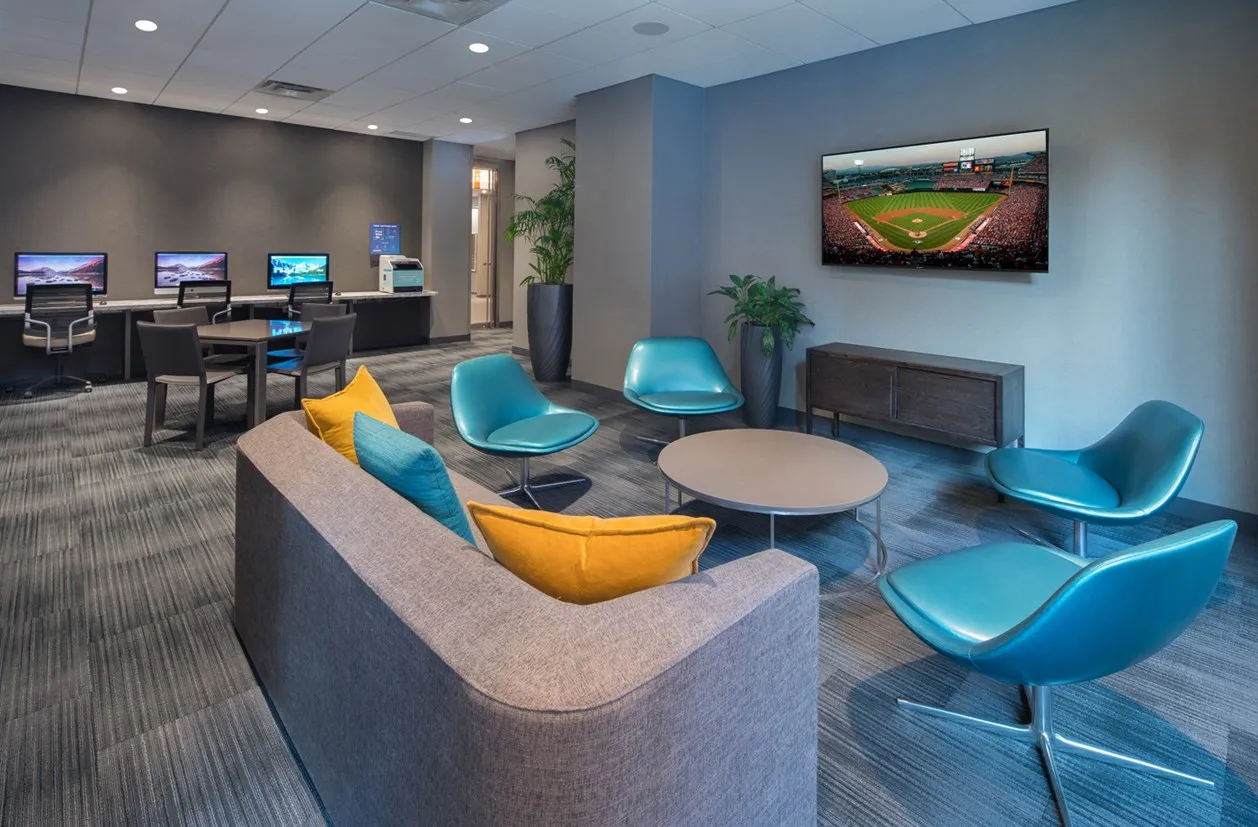 living room furnished model unit at Elm Street Plaza Apartments