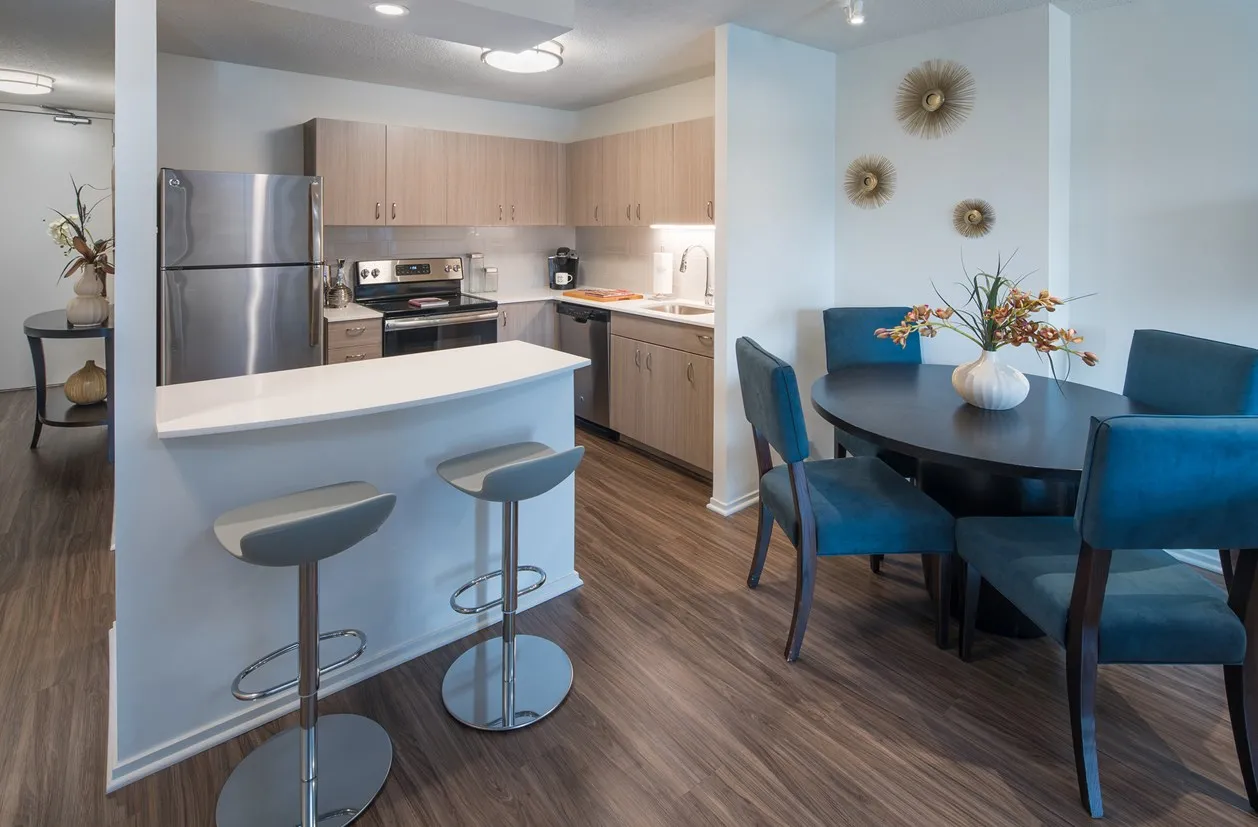 living room furnished model unit at Elm Street Plaza Apartments