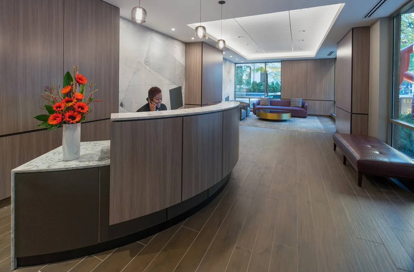 living room furnished model unit at Elm Street Plaza Apartments