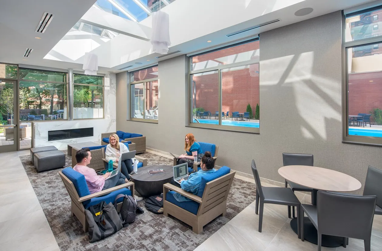 living room furnished model unit at Elm Street Plaza Apartments