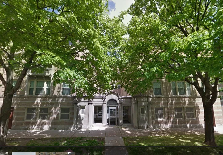exterior shot with trees of 1310 East Hyde Park Apartments