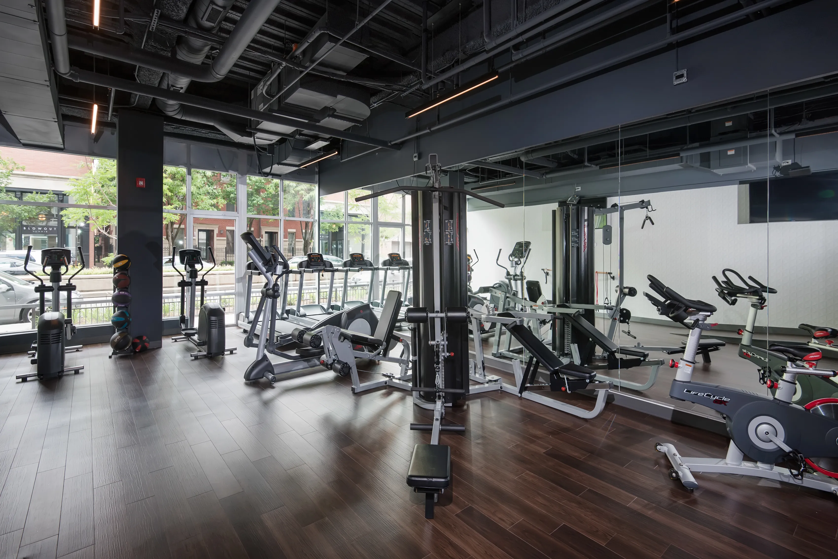 model living rooms with view at Luxe on Madison Apartments