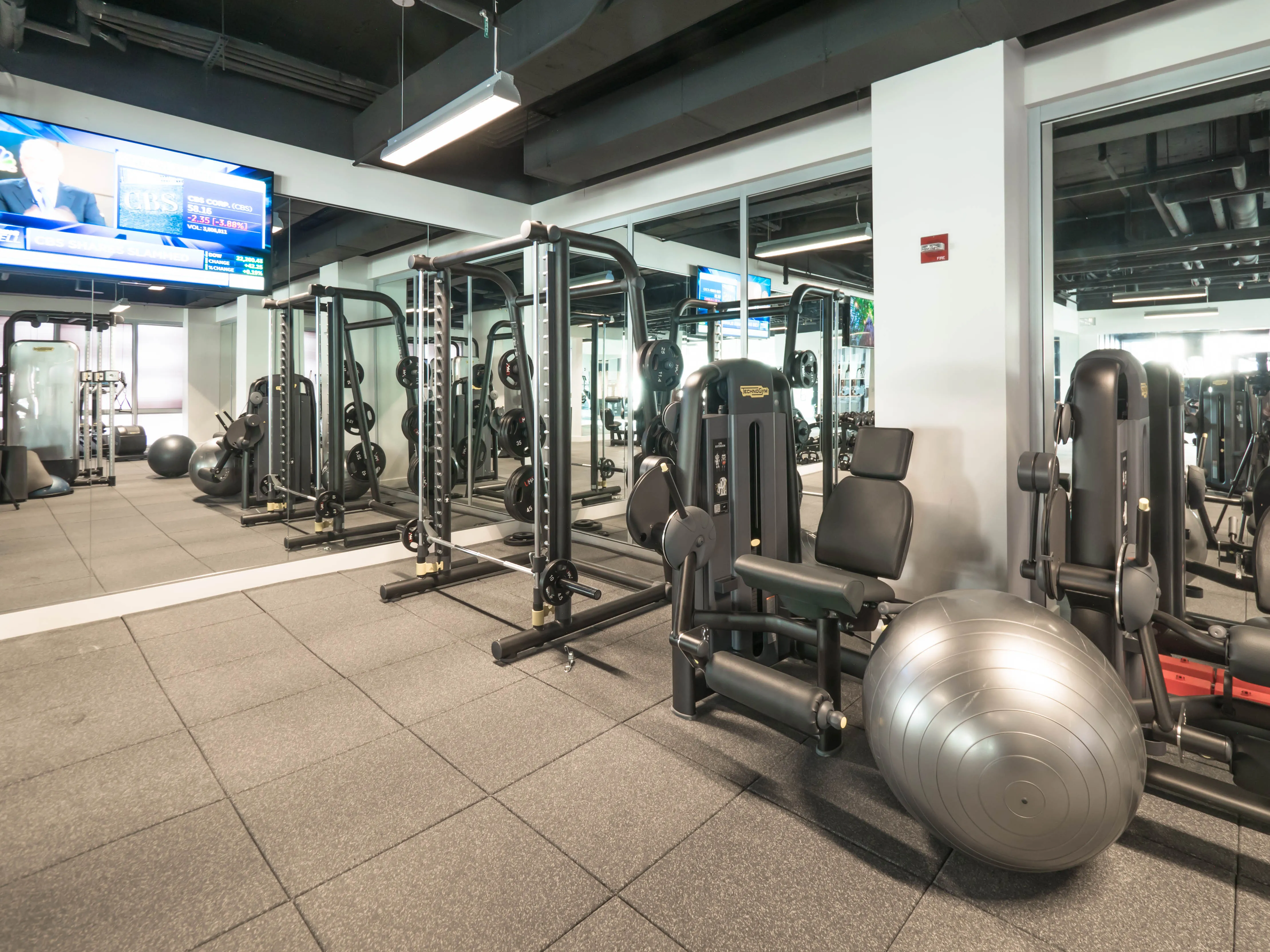 model corner furnished living room at Two West Delaware Apartments