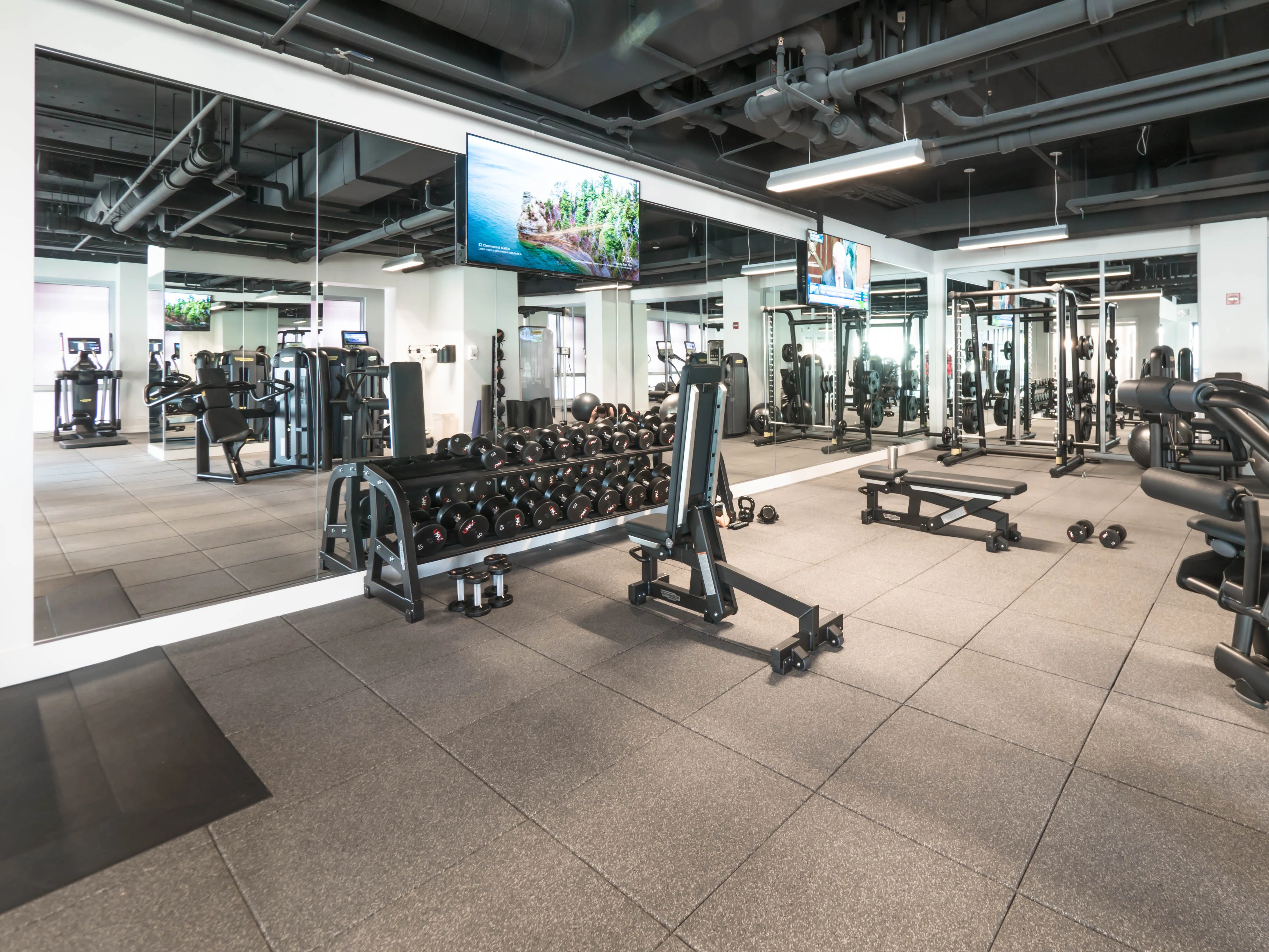 model corner furnished living room at Two West Delaware Apartments
