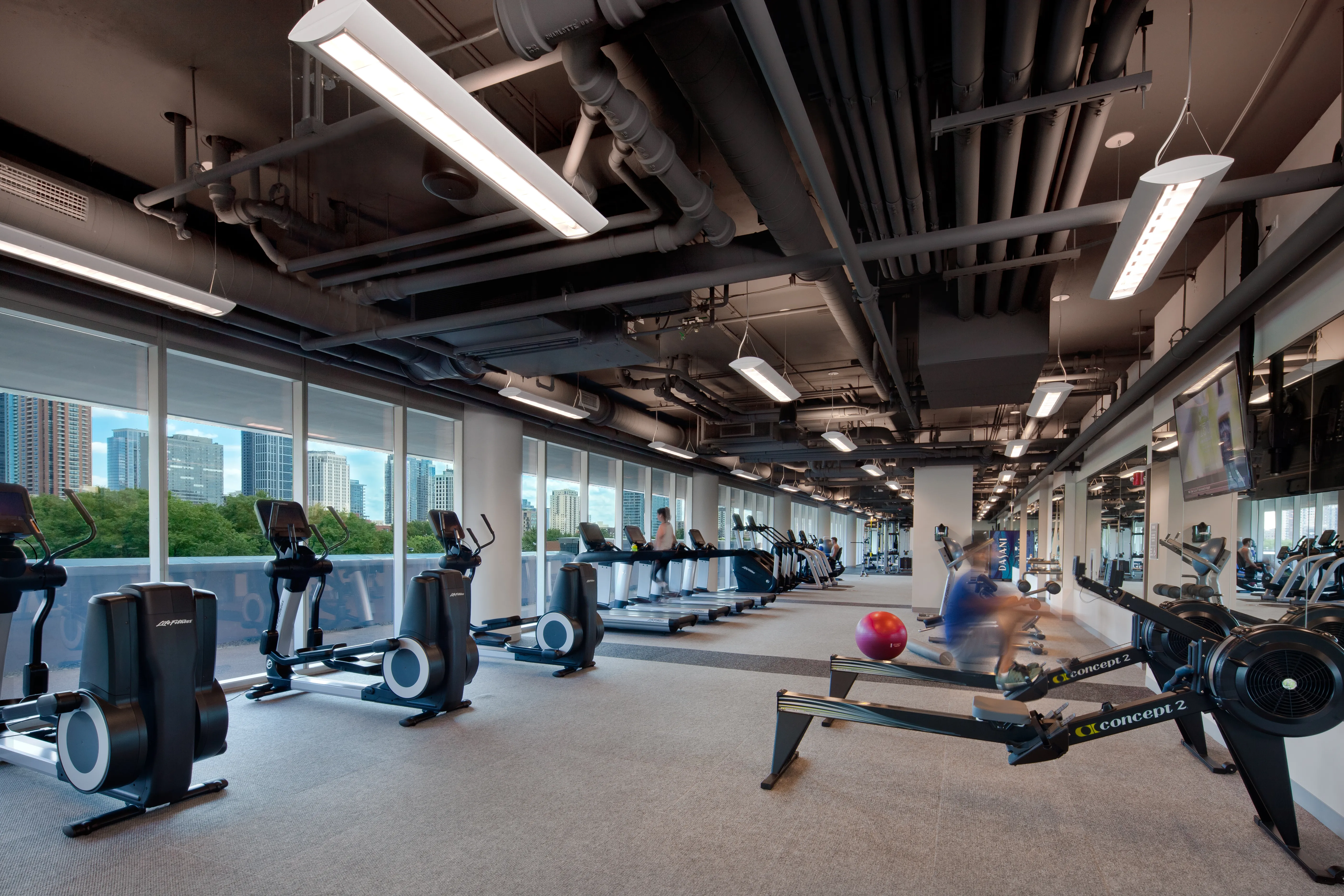 living room and skyline view at 1000 South Clark Apartments