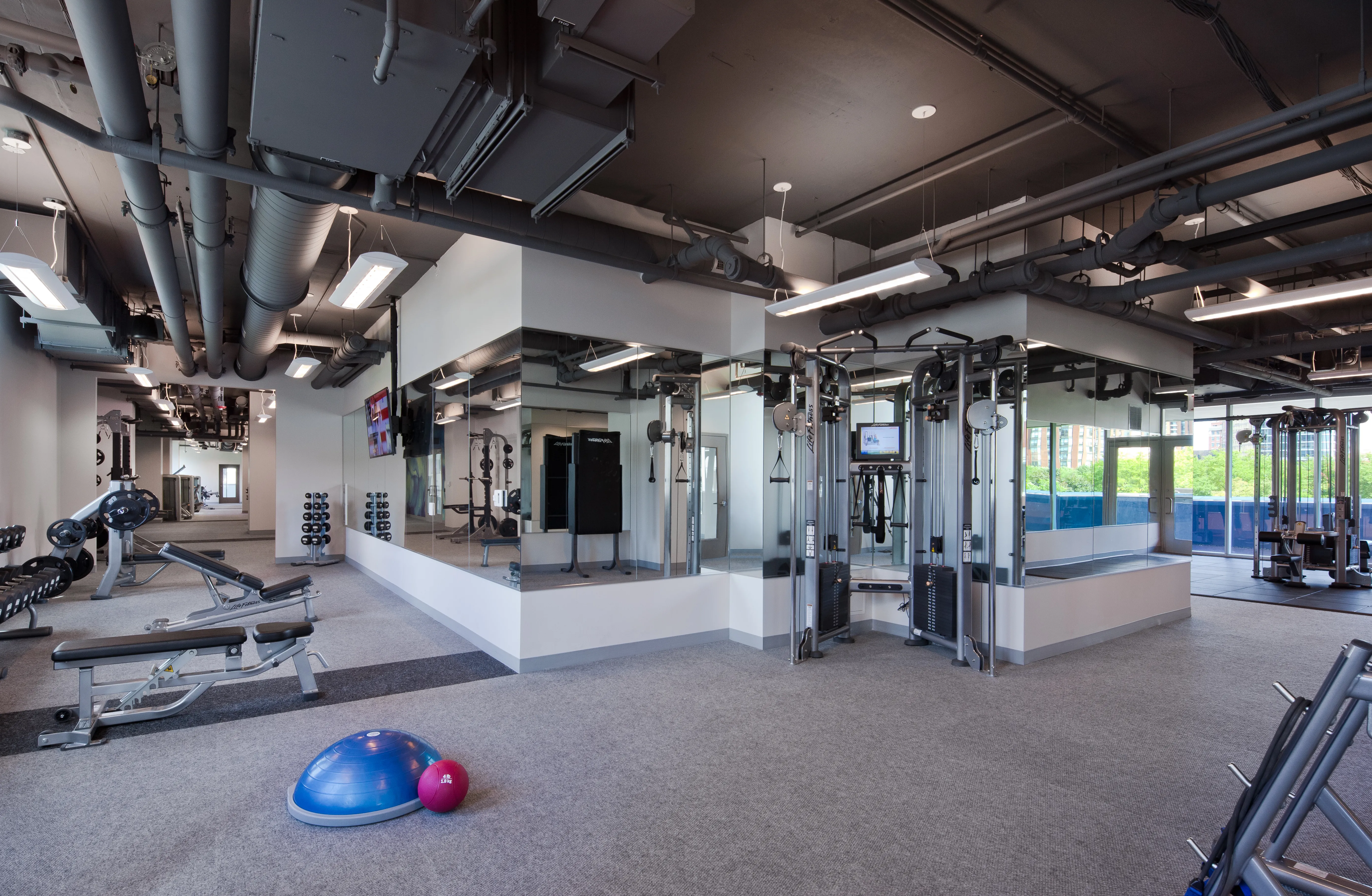 living room and skyline view at 1000 South Clark Apartments