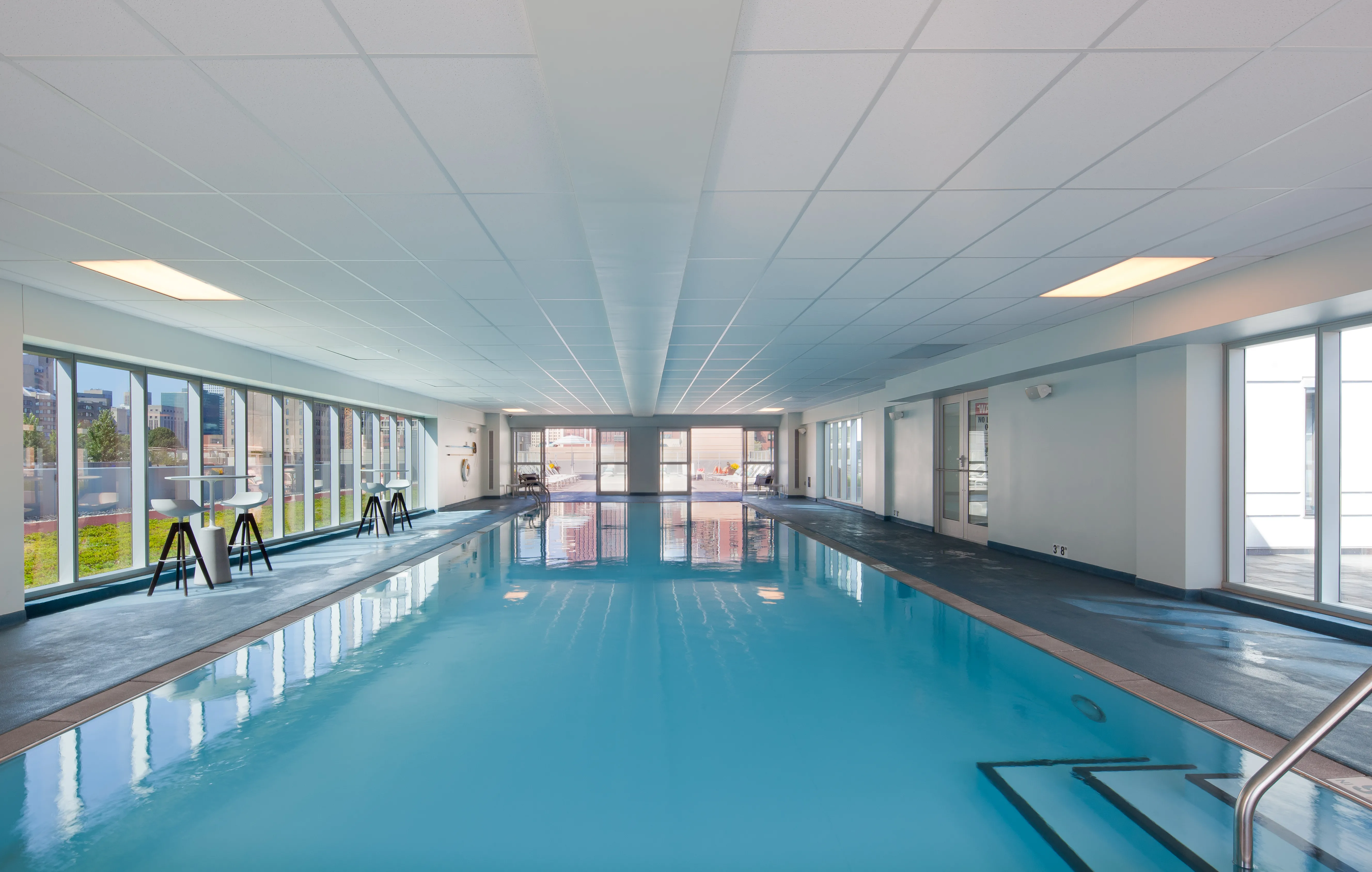 living room and skyline view at 1000 South Clark Apartments