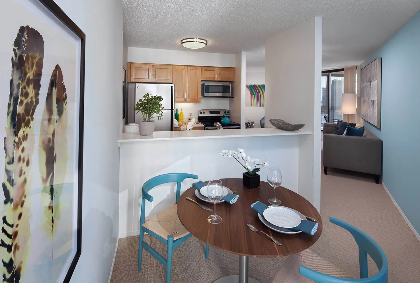 kitchen and breakfast table in model at Asbury Plaza Apartments