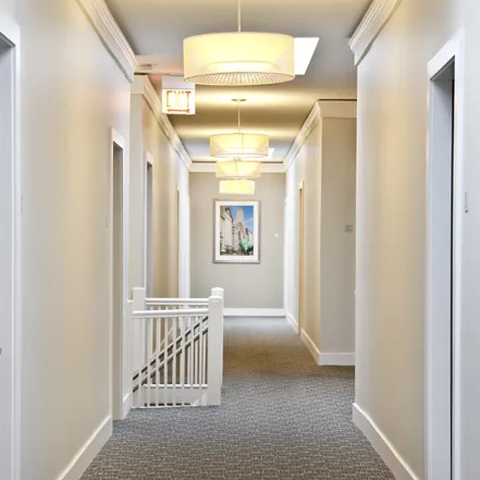 corner view of Reside 2525 Apartments with Starbucks on 1st floor