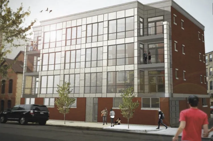 model kitchen and living room with wood floors at Huron Place Apartments